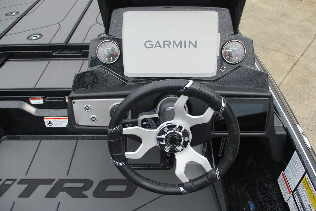 Steering console of 2026 Tracker Pro Guide V-16 WT with Garmin display.