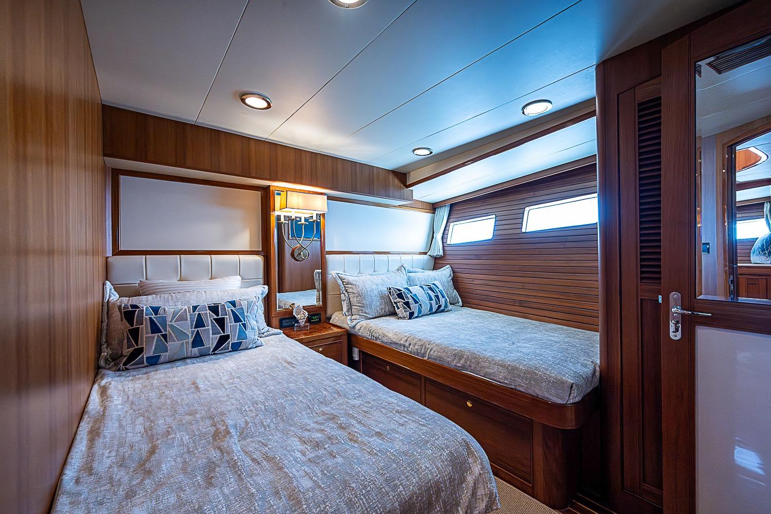 Luxurious twin cabin interior on 2014 Marlow 80 Explorer yacht.