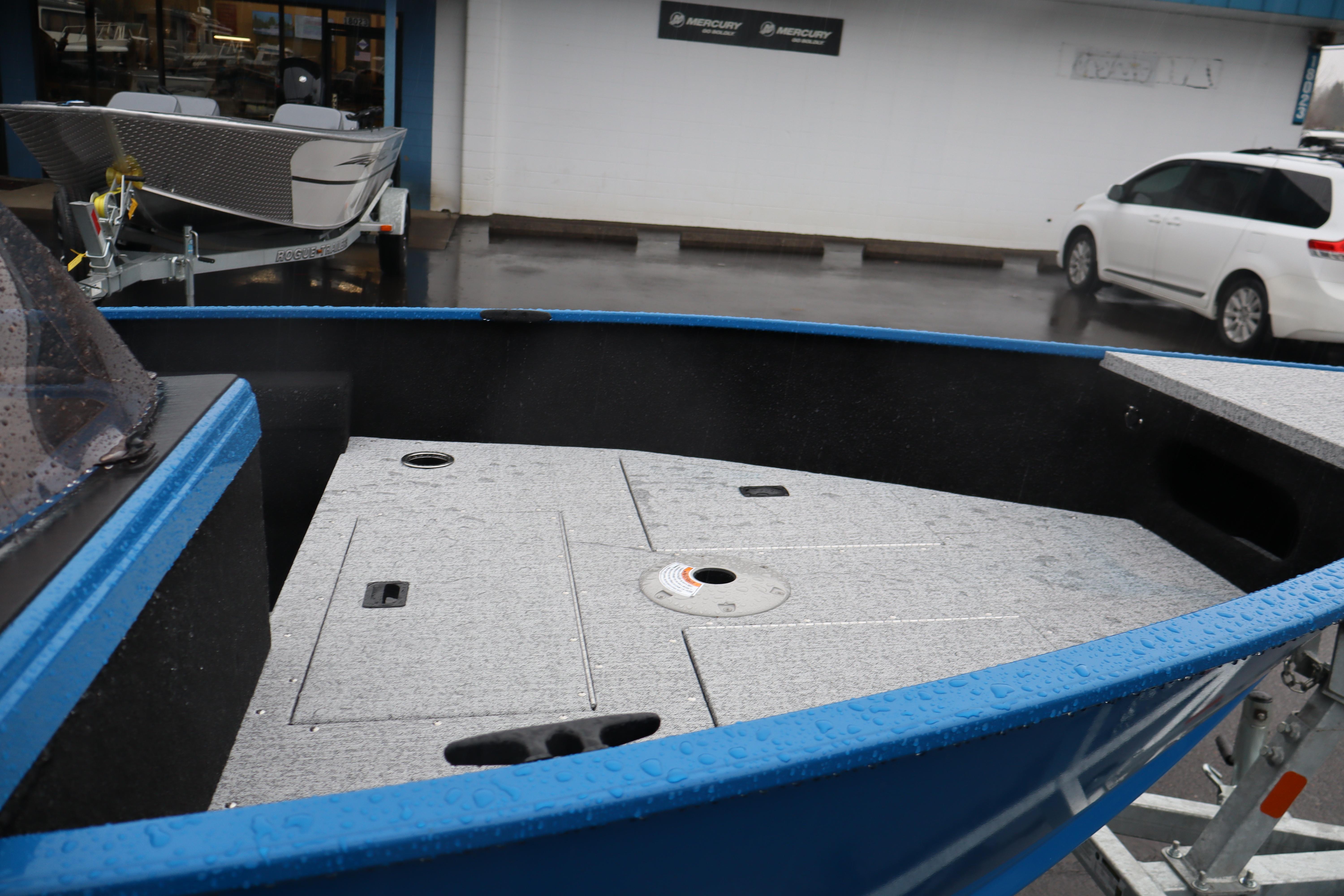 2026 Smoker Craft Lazer 161 boat with blue exterior and spacious deck.