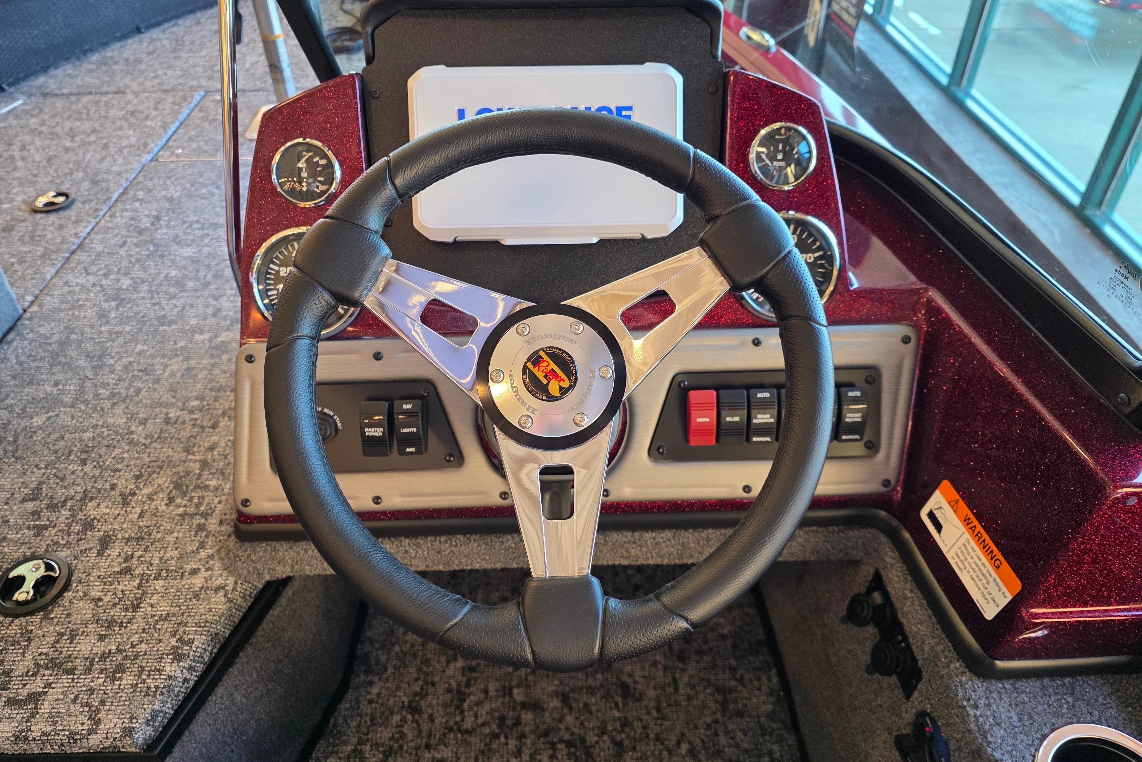 2026 Ranger VS1782SC Reata boat dashboard with steering wheel and control panel.