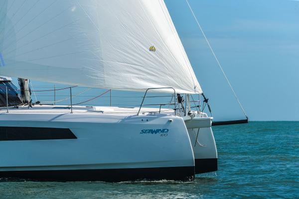 2025 Seawind 1170 catamaran sailing on the ocean.