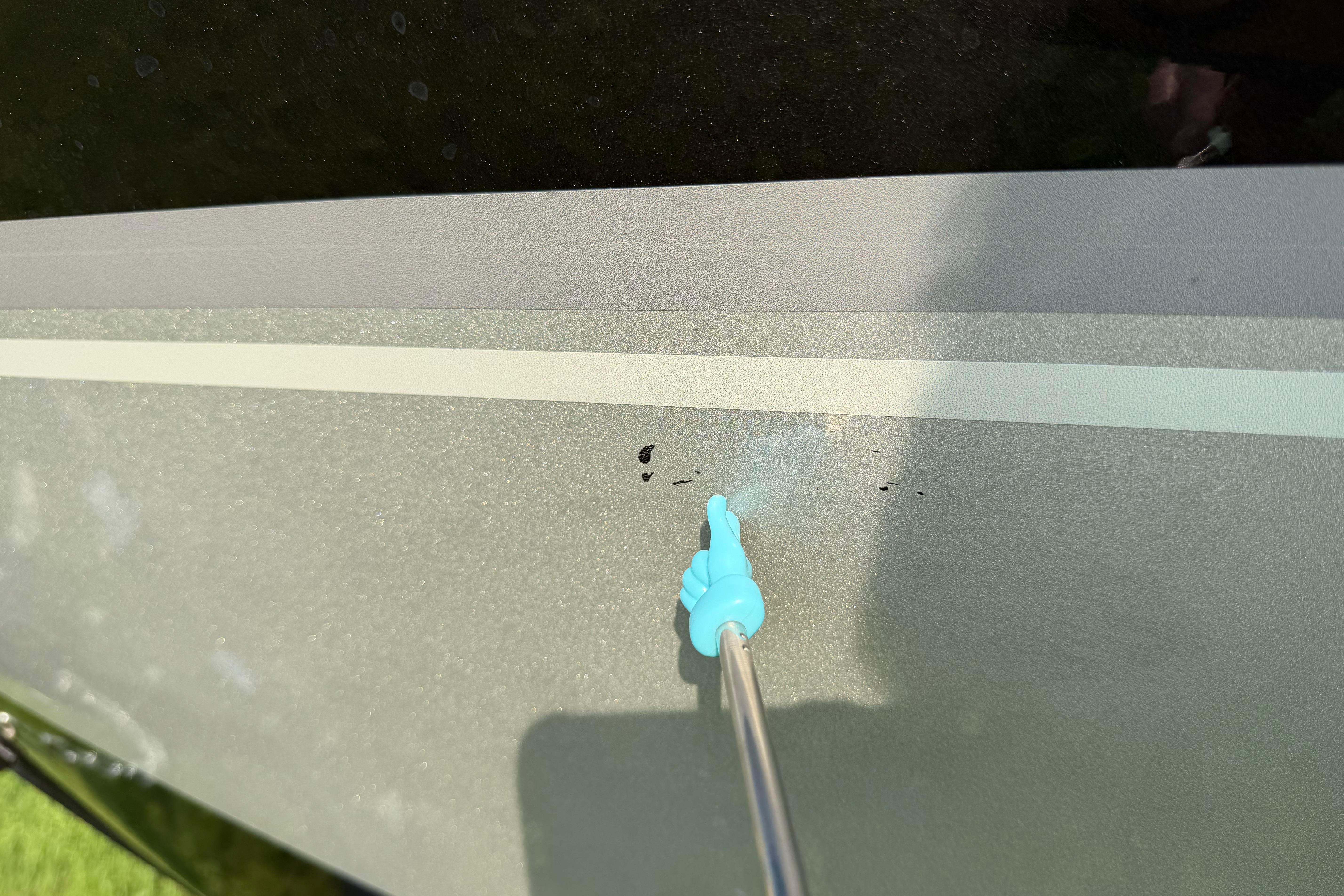 2019 Alumacraft Trophy 205 boat surface with minor blemishes highlighted.