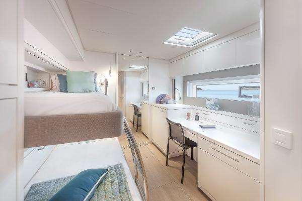 Luxurious interior of 2025 Lagoon SIXTY 5 yacht with modern design and natural light.