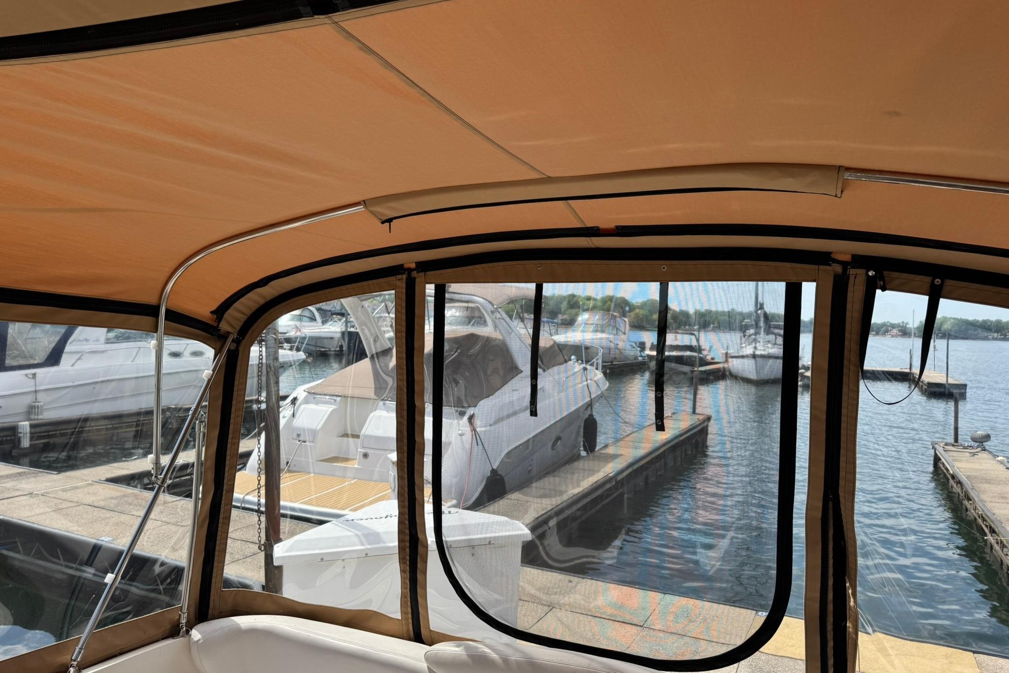 Interior view of a 2001 Sea Ray 340 Sundancer docked at a marina.