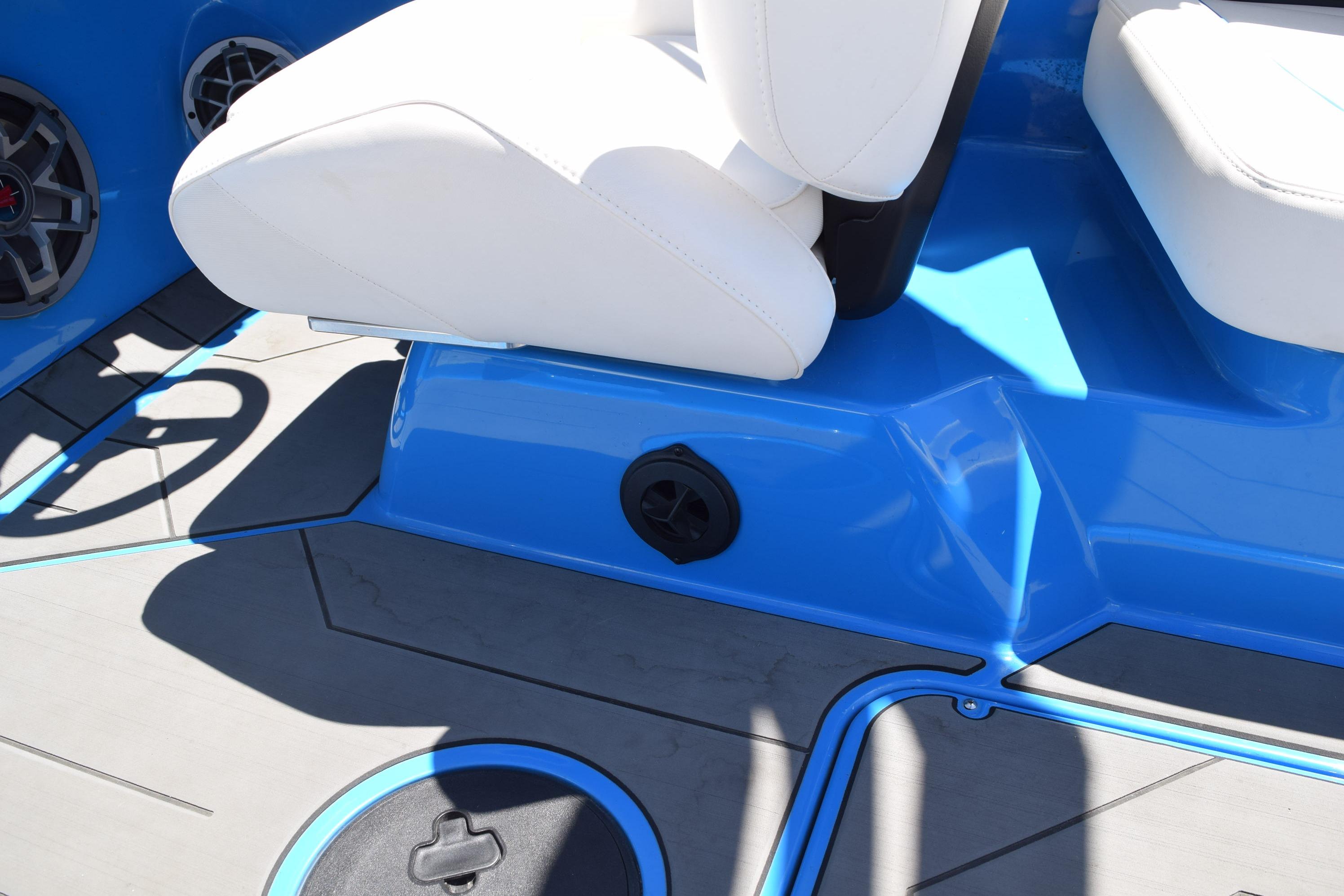 2019 Axis A22 boat interior with white seating and blue accents.