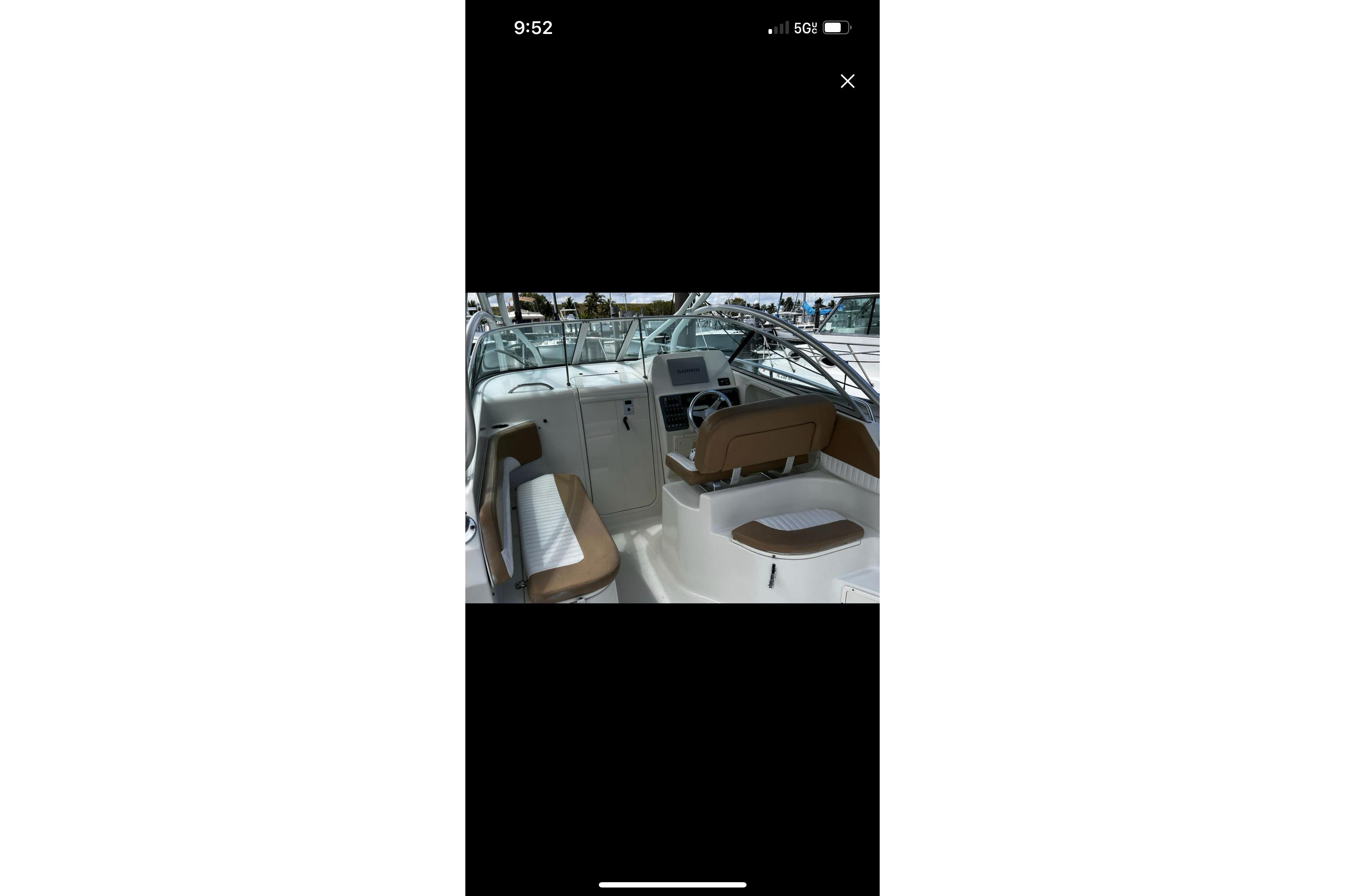 2007 Hydra-Sports Vector 2500 VX boat interior with seating and helm controls.