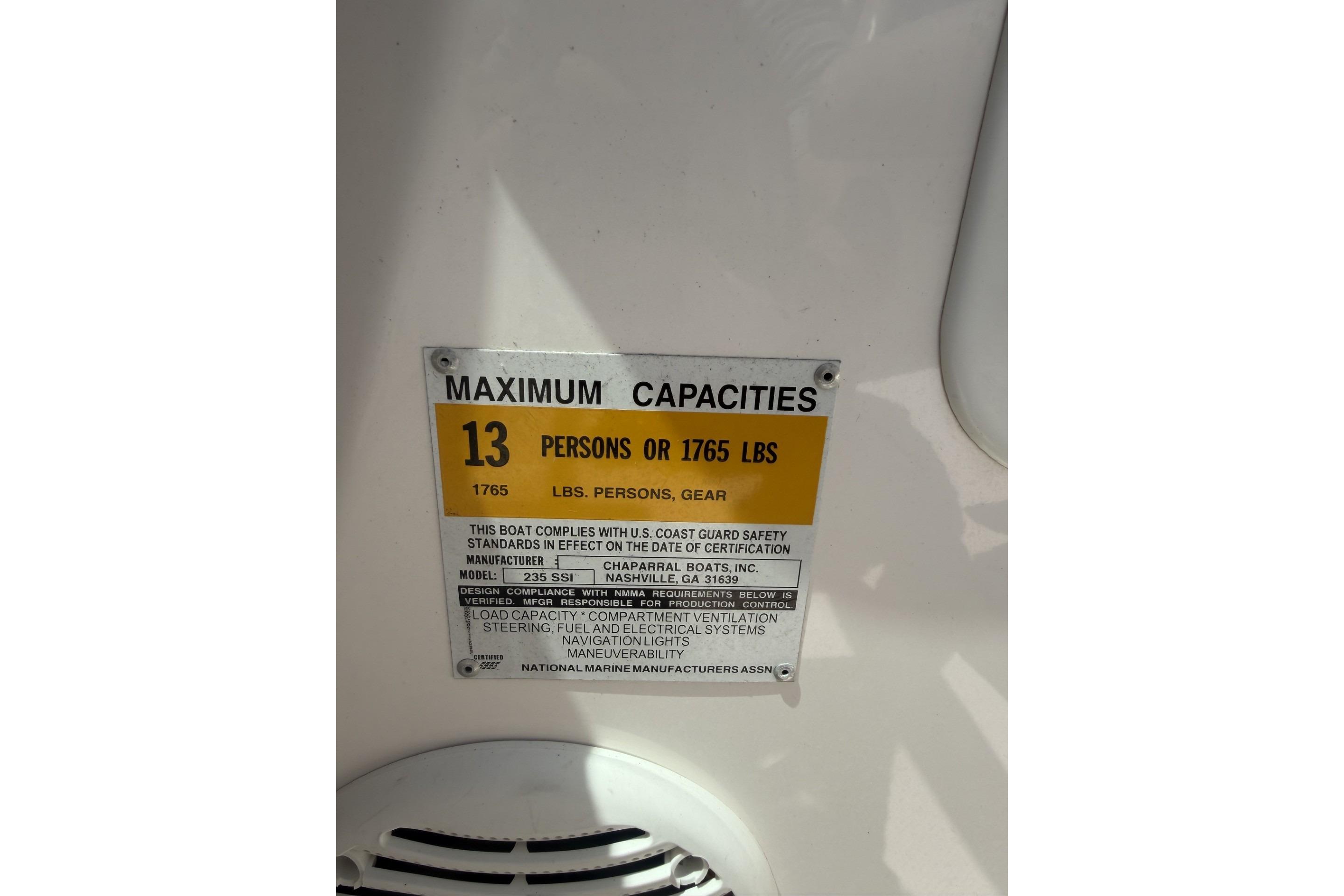 2001 Chaparral 235 SSi capacity label: 13 persons or 1765 lbs maximum.