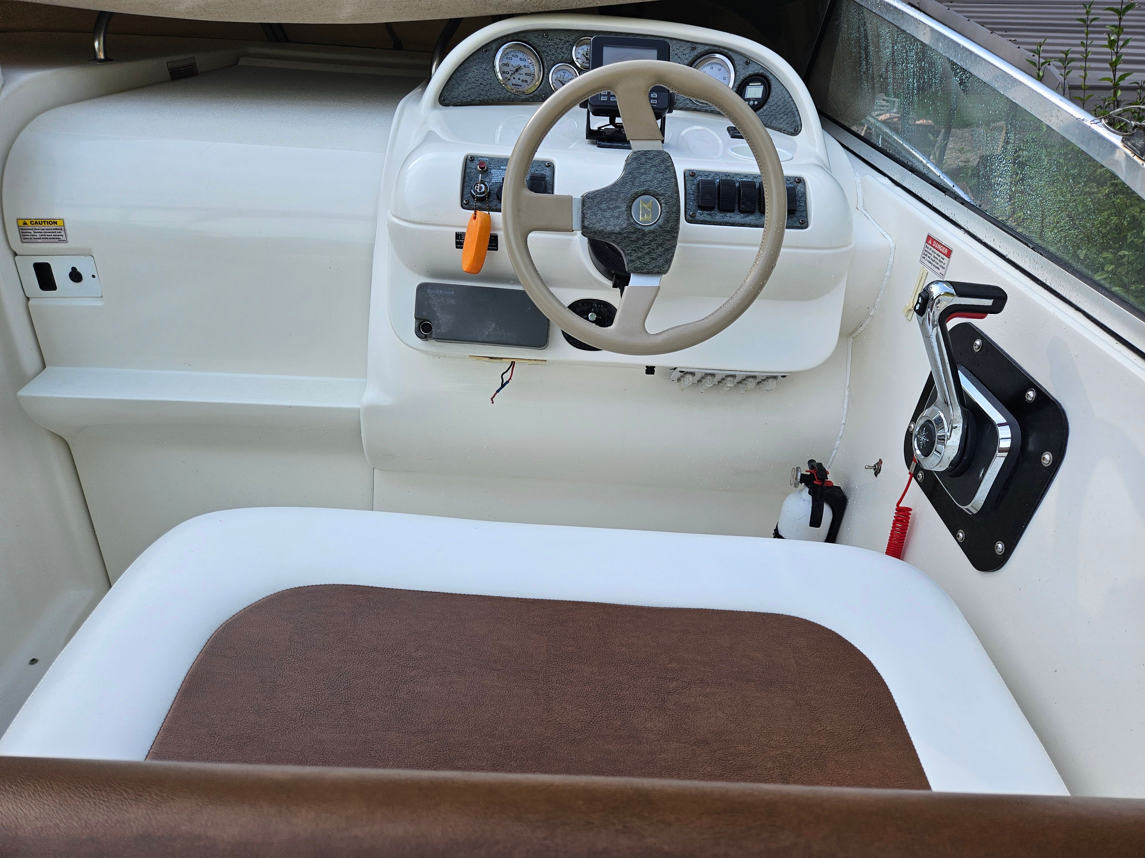 Interior view of a 1998 Larson Cabrio 254 boat.