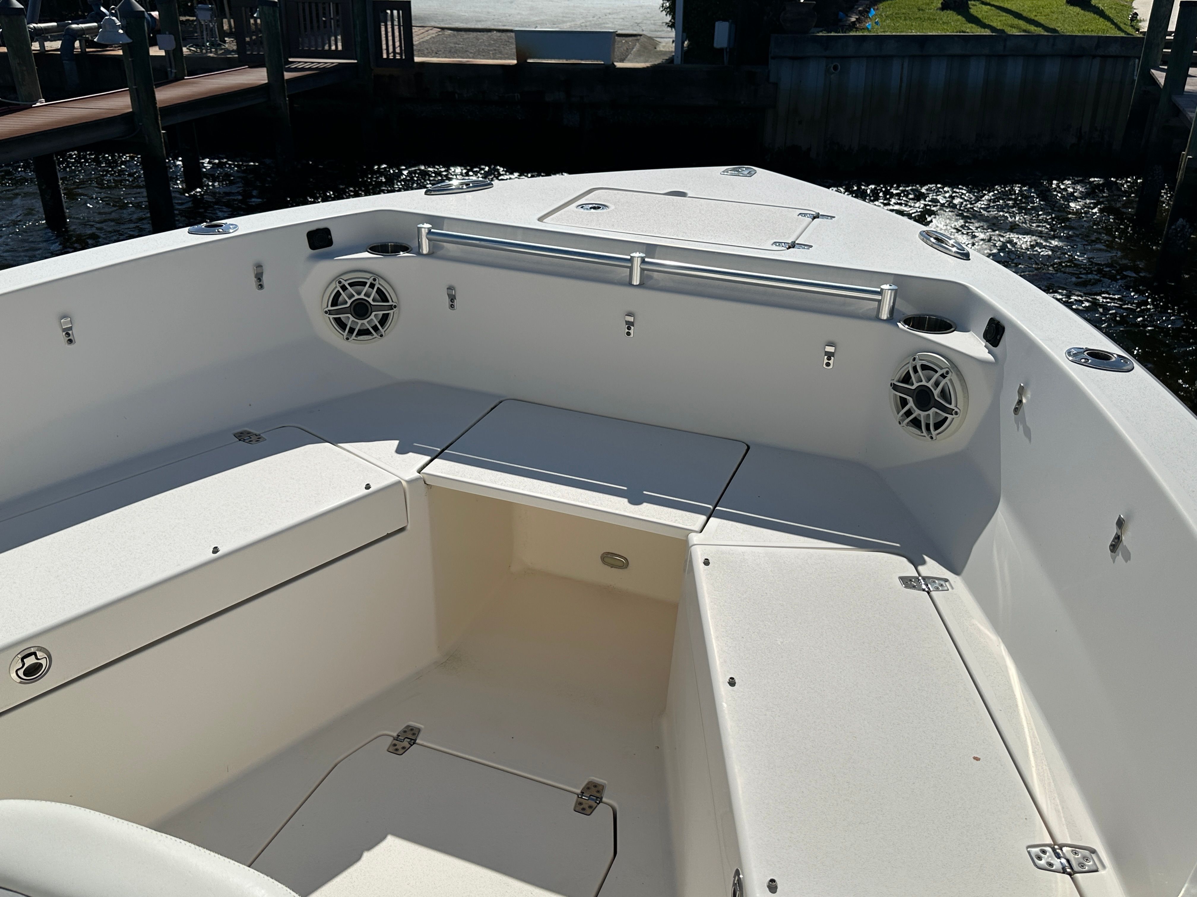 Cobia 240 Center Console 2022 with spacious bow area and speakers.