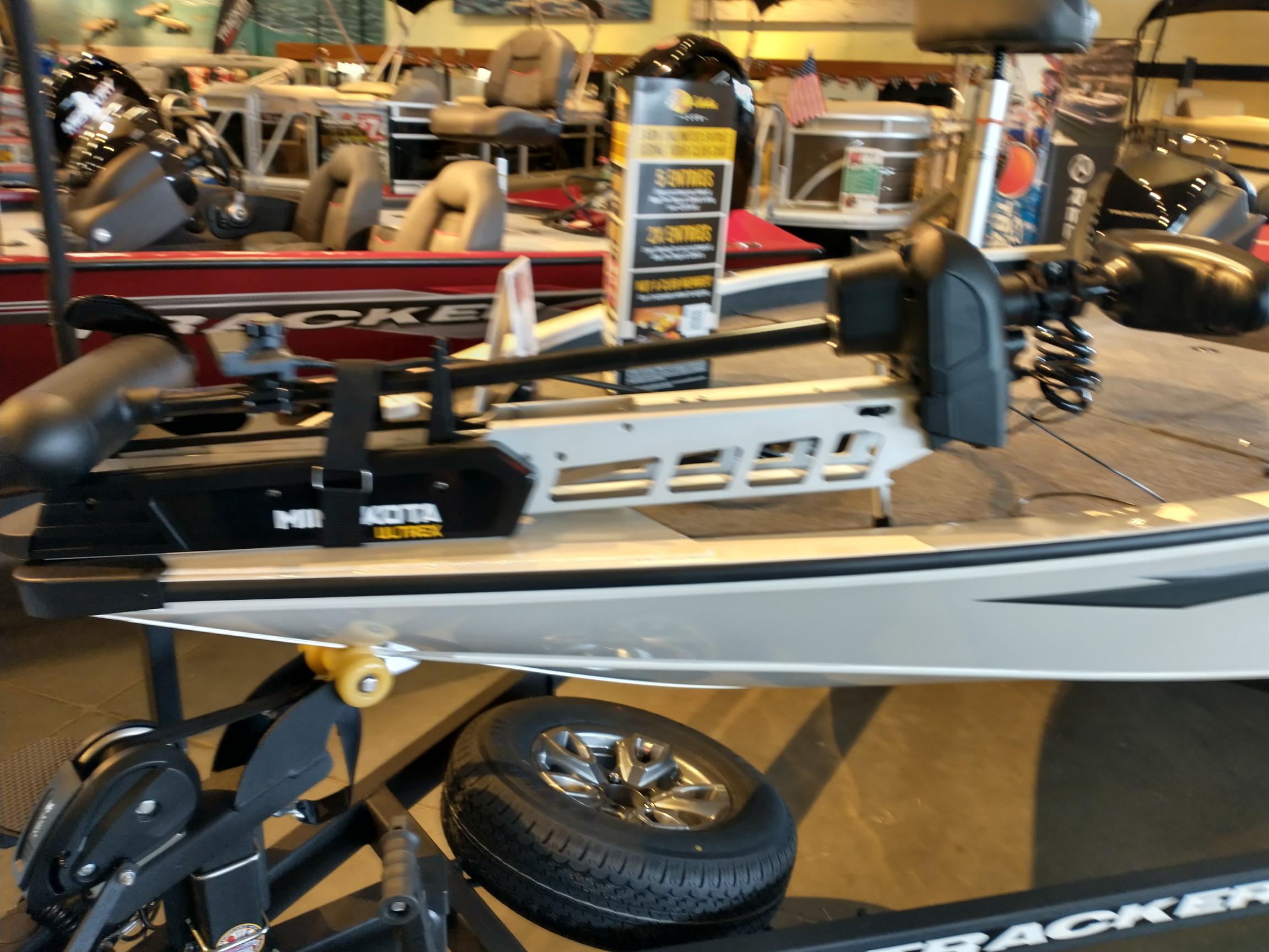 2025 Tracker Savage 215 boat with Minn Kota Ultrex motor in showroom.
