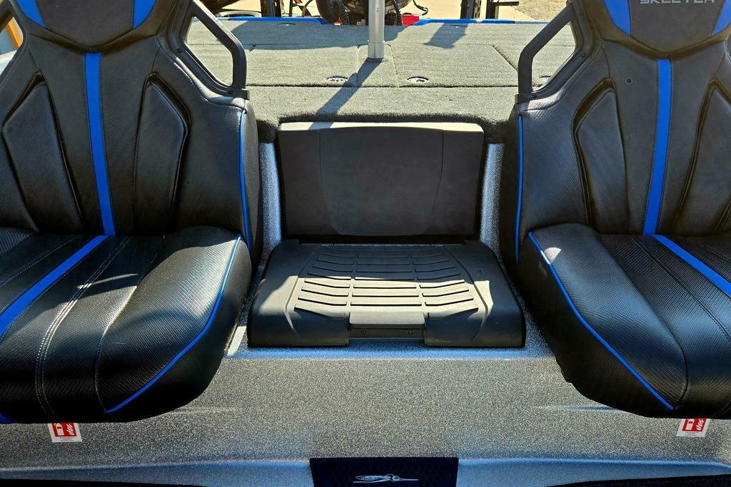 2026 Skeeter ZXE20 boat interior with black and blue seats, showcasing modern design.