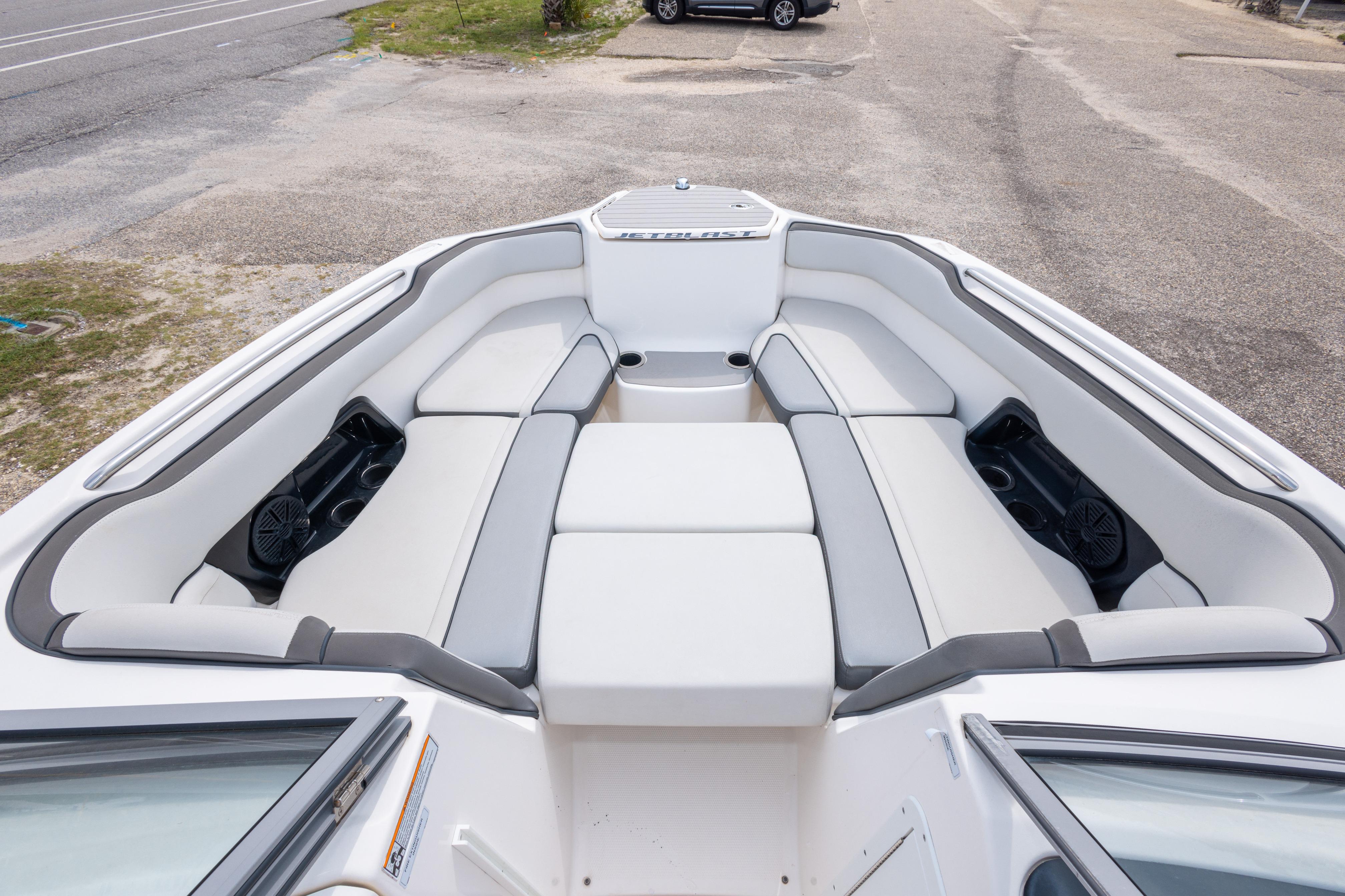 2021 Yamaha Boats AR250 interior with spacious seating and cup holders.