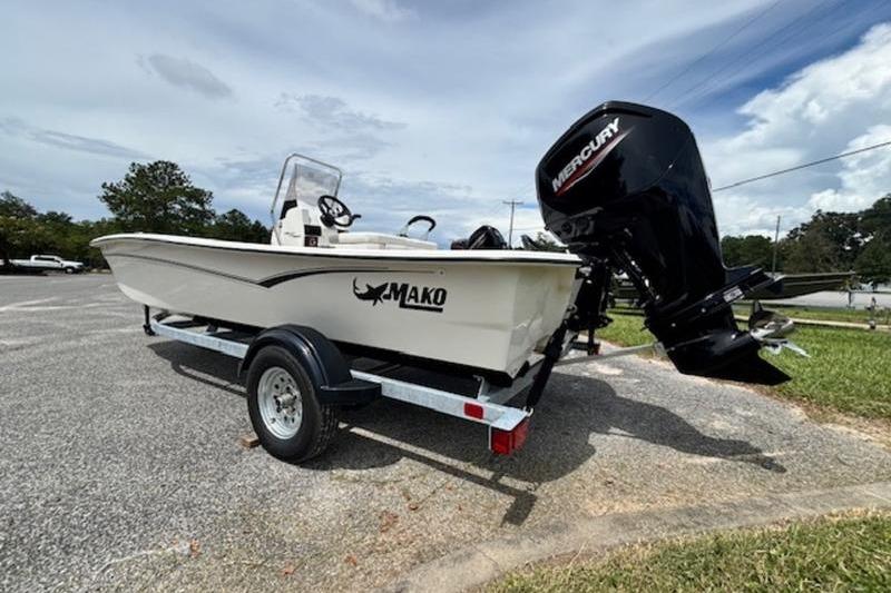 2026 Mako Pro Skiff 17 CC boat on trailer with Mercury outboard motor.