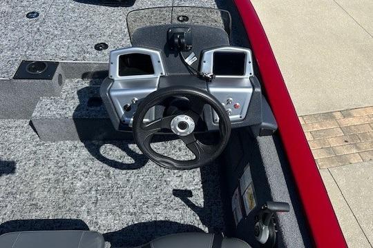 2026 Tracker Pro Team 175 boat dashboard with steering wheel and dual displays.