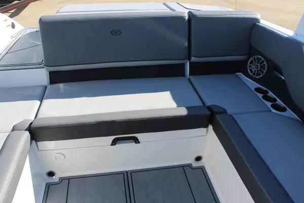 2025 Cobalt CS23 boat interior with gray seating and cup holders.