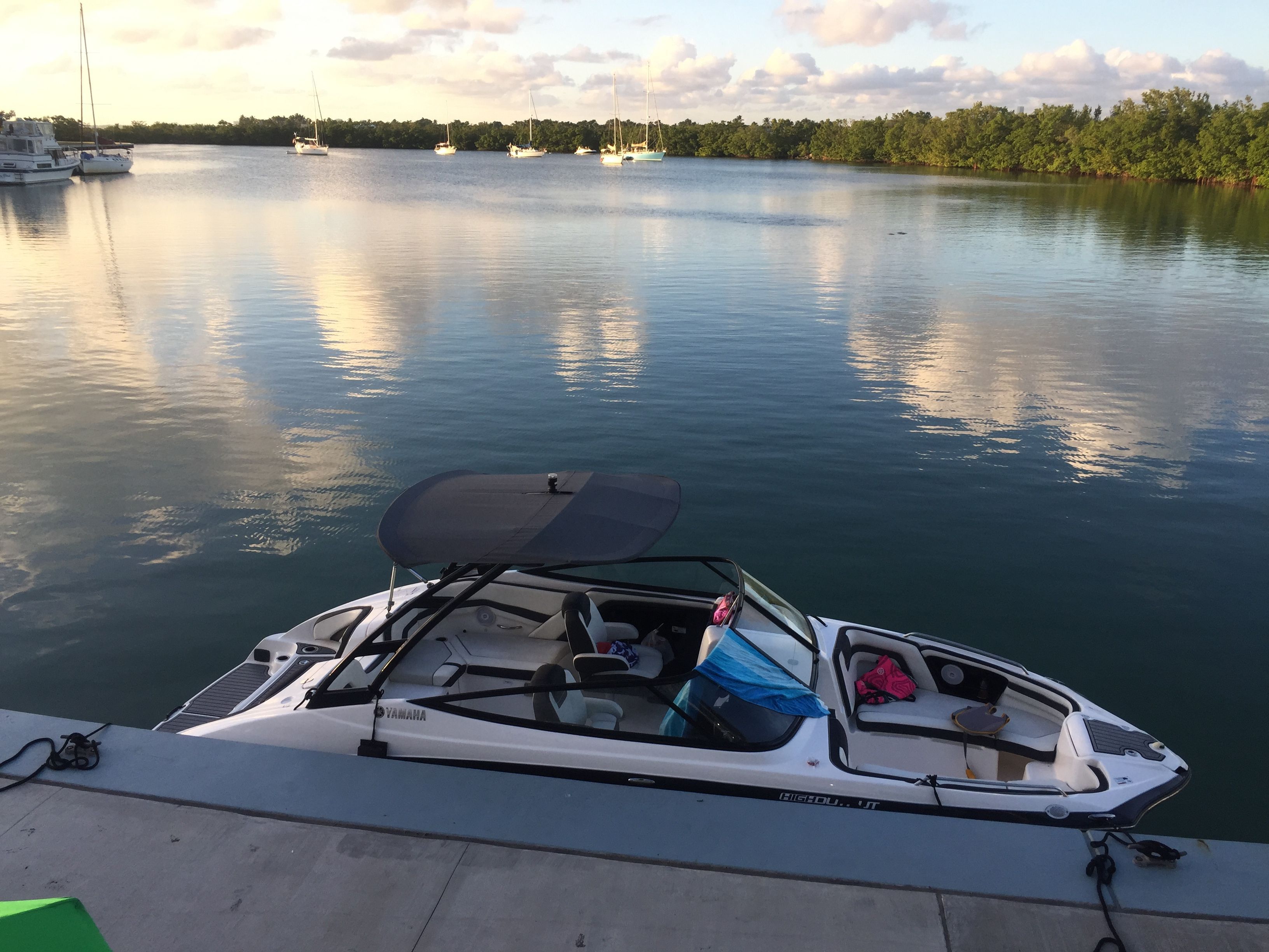 2016 Yamaha AR240 boat docked at serene lakeside.