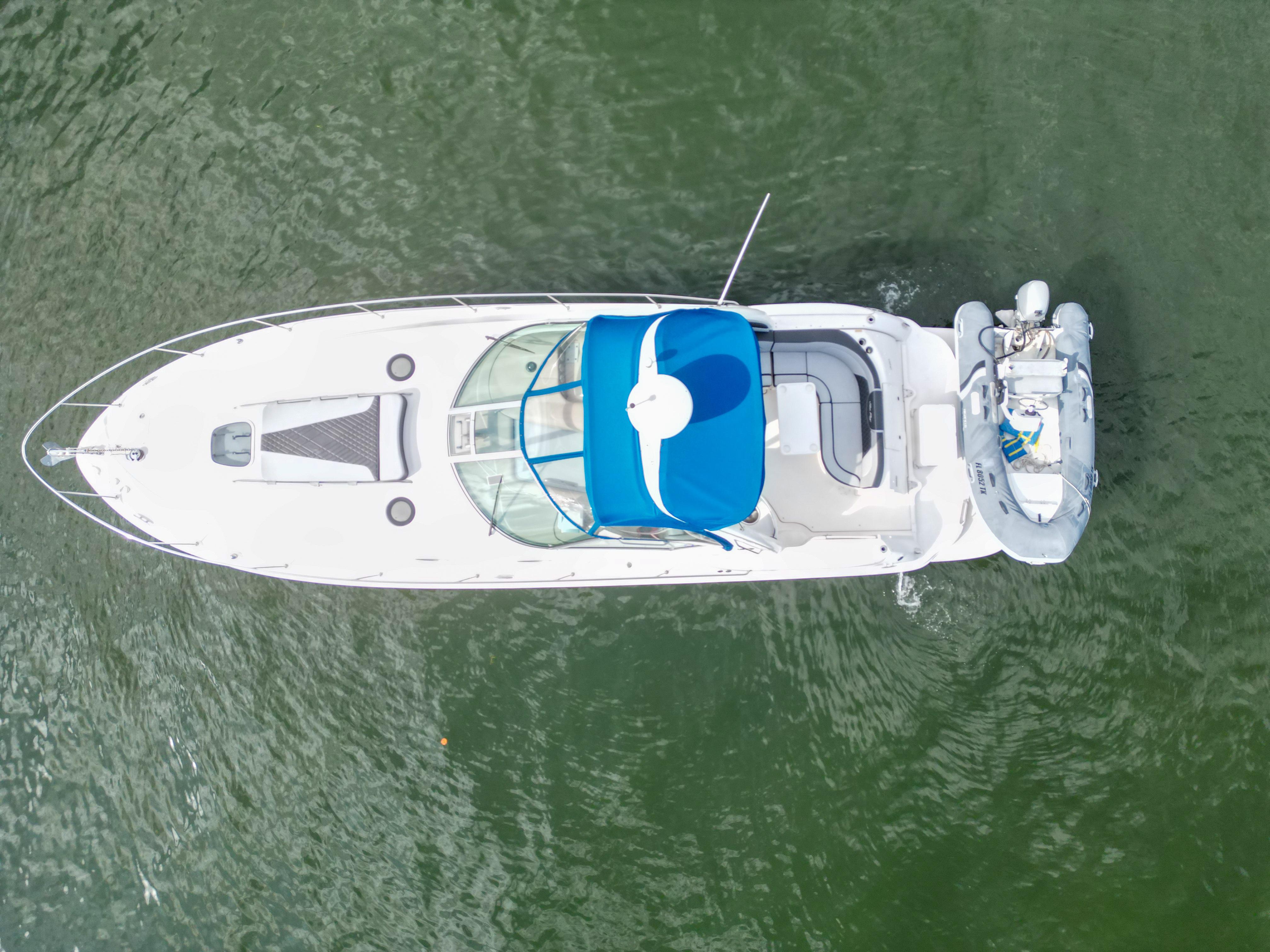 Aerial view of 2005 Sea Ray 340 Sundancer yacht on water.