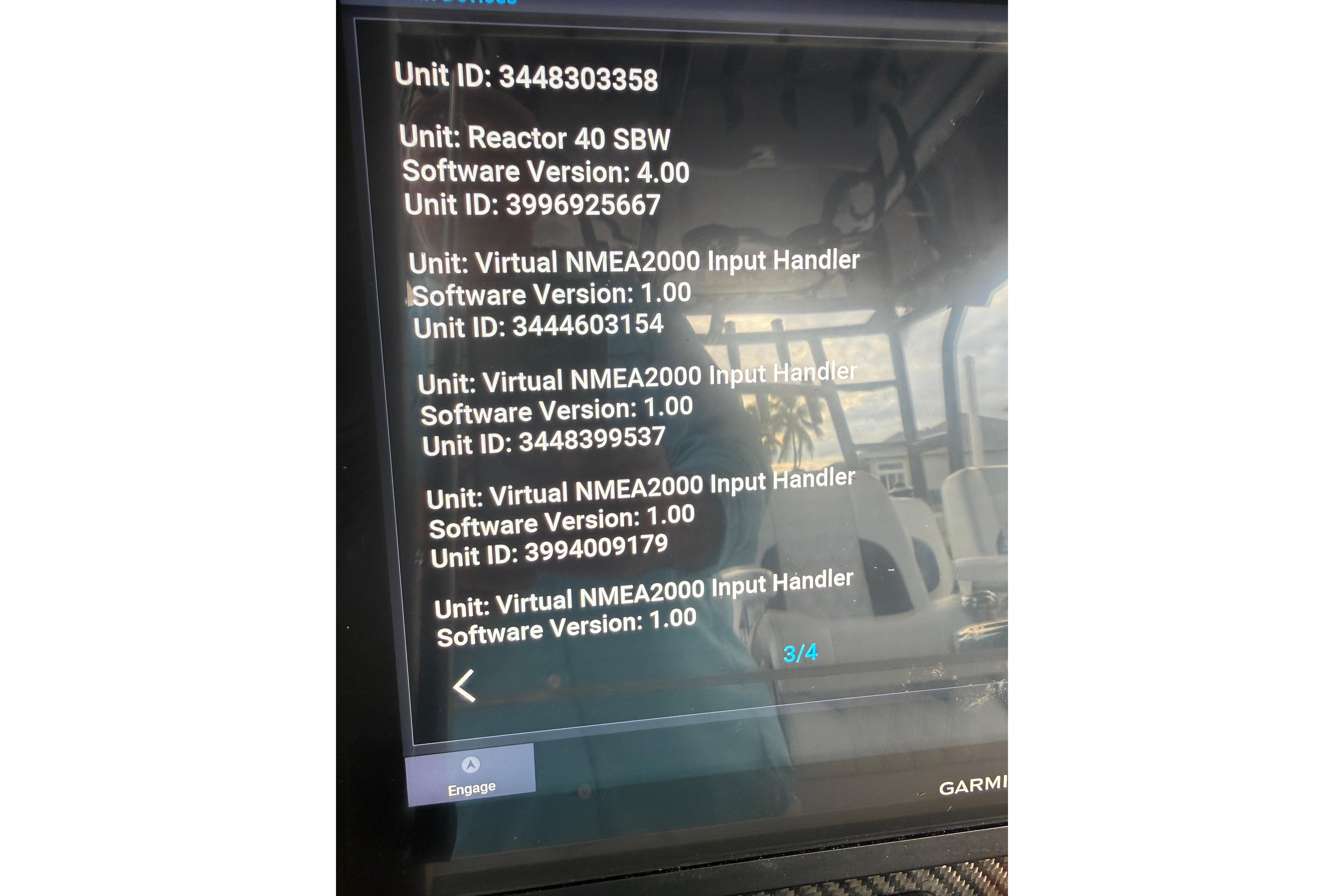 Display screen showing software versions and unit IDs on a 2020 SeaHunter 41 CTS boat.