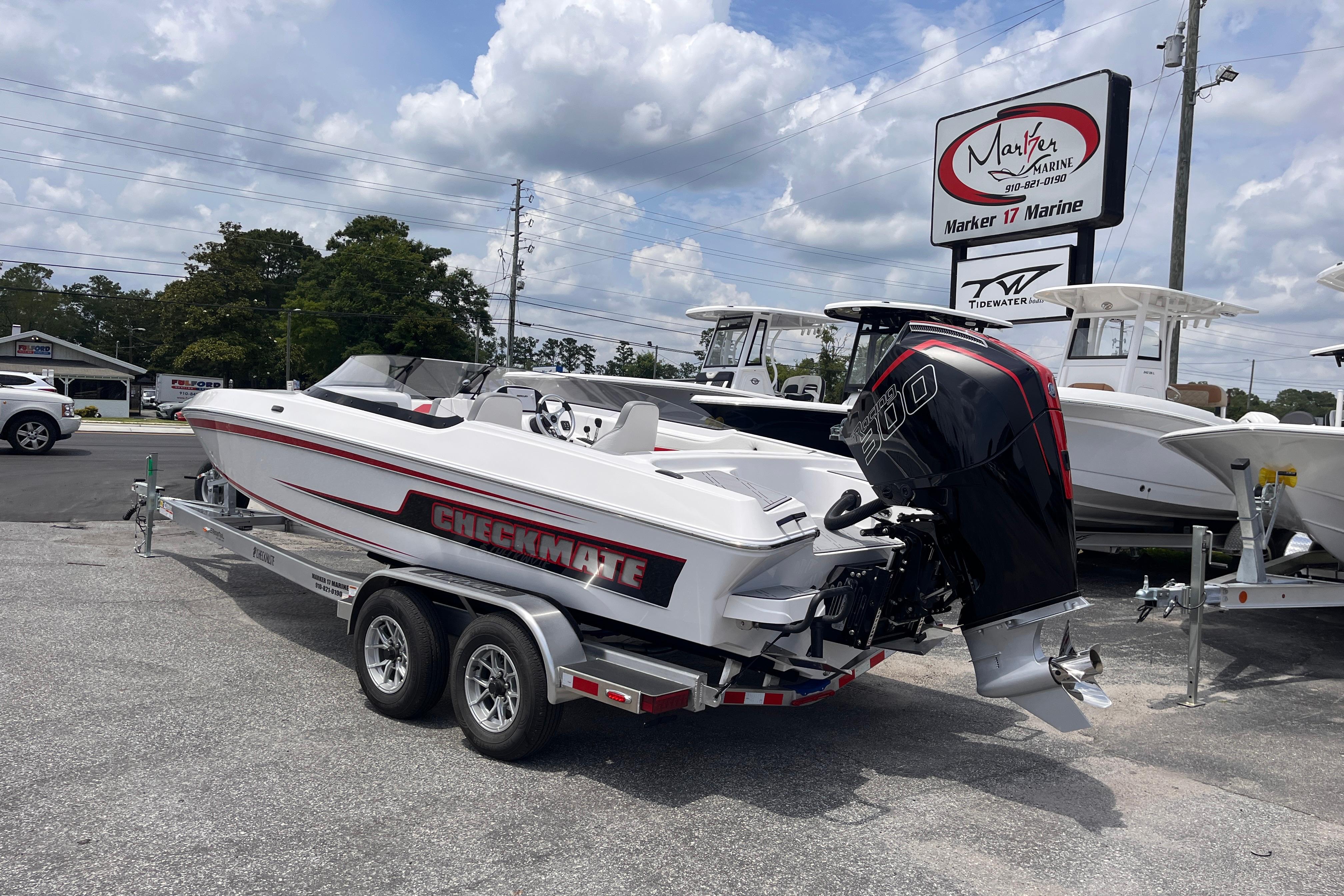 Checkmate Pulsare 2400 BRX 2025 on trailer at Marker 17 Marine.
