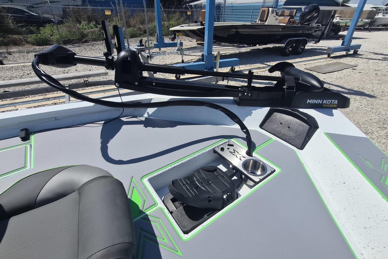2026 Xpress H18 boat deck with Minn Kota trolling motor and seating.