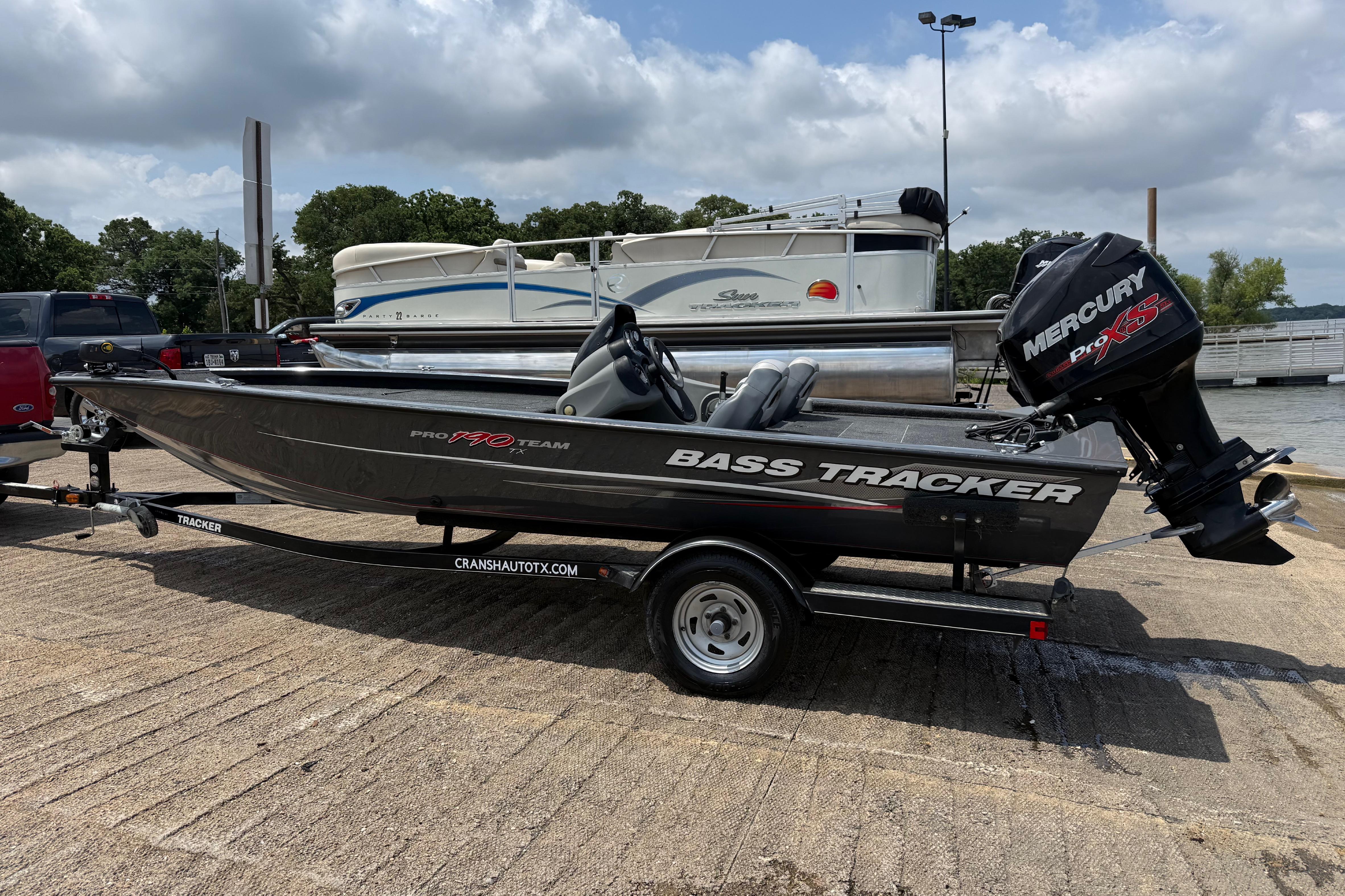 2015 Tracker Pro Team 190 TX bass boat on trailer, featuring Mercury Pro XS engine.