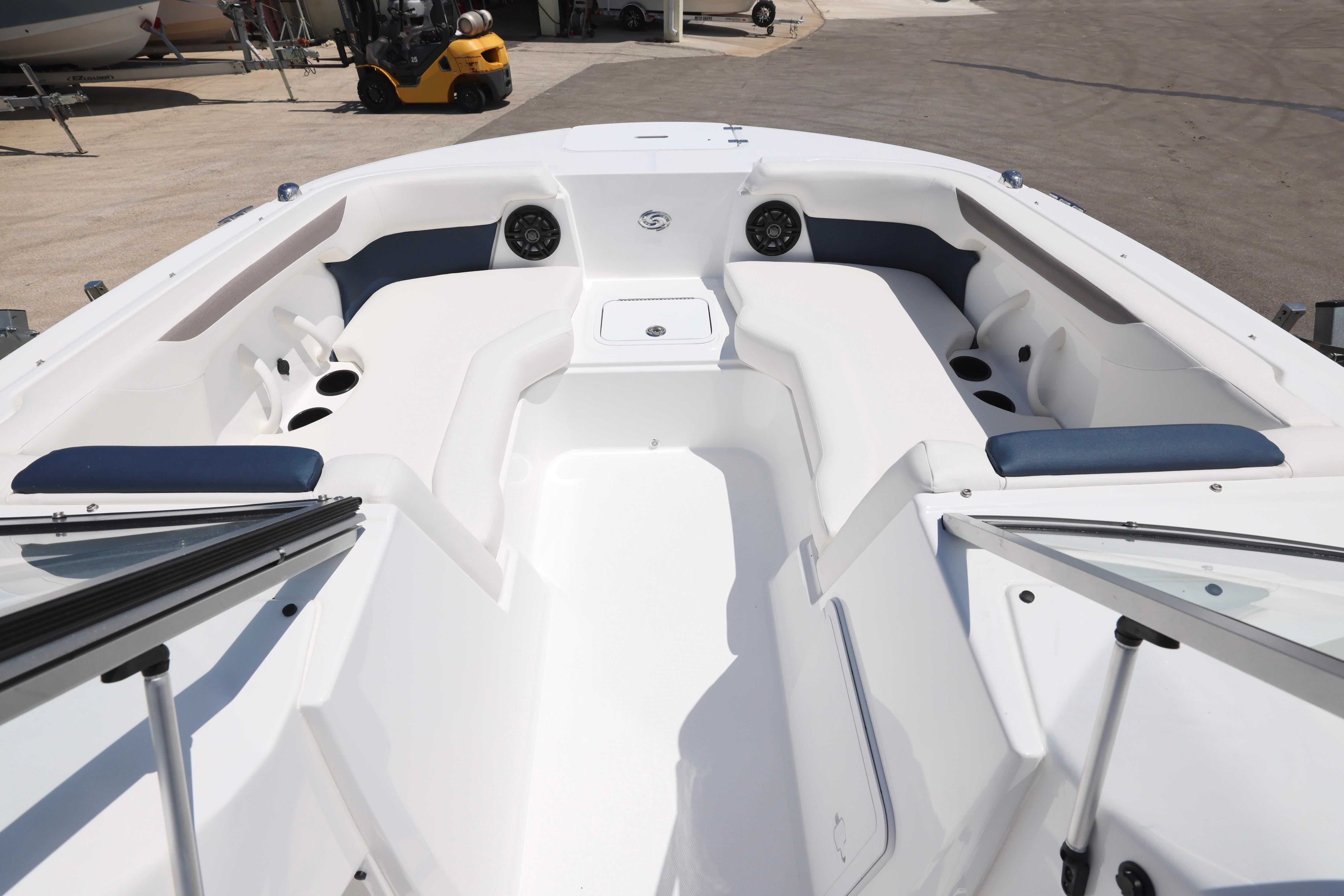 2026 Hurricane SunDeck 2050 OB boat interior with spacious seating and cup holders.
