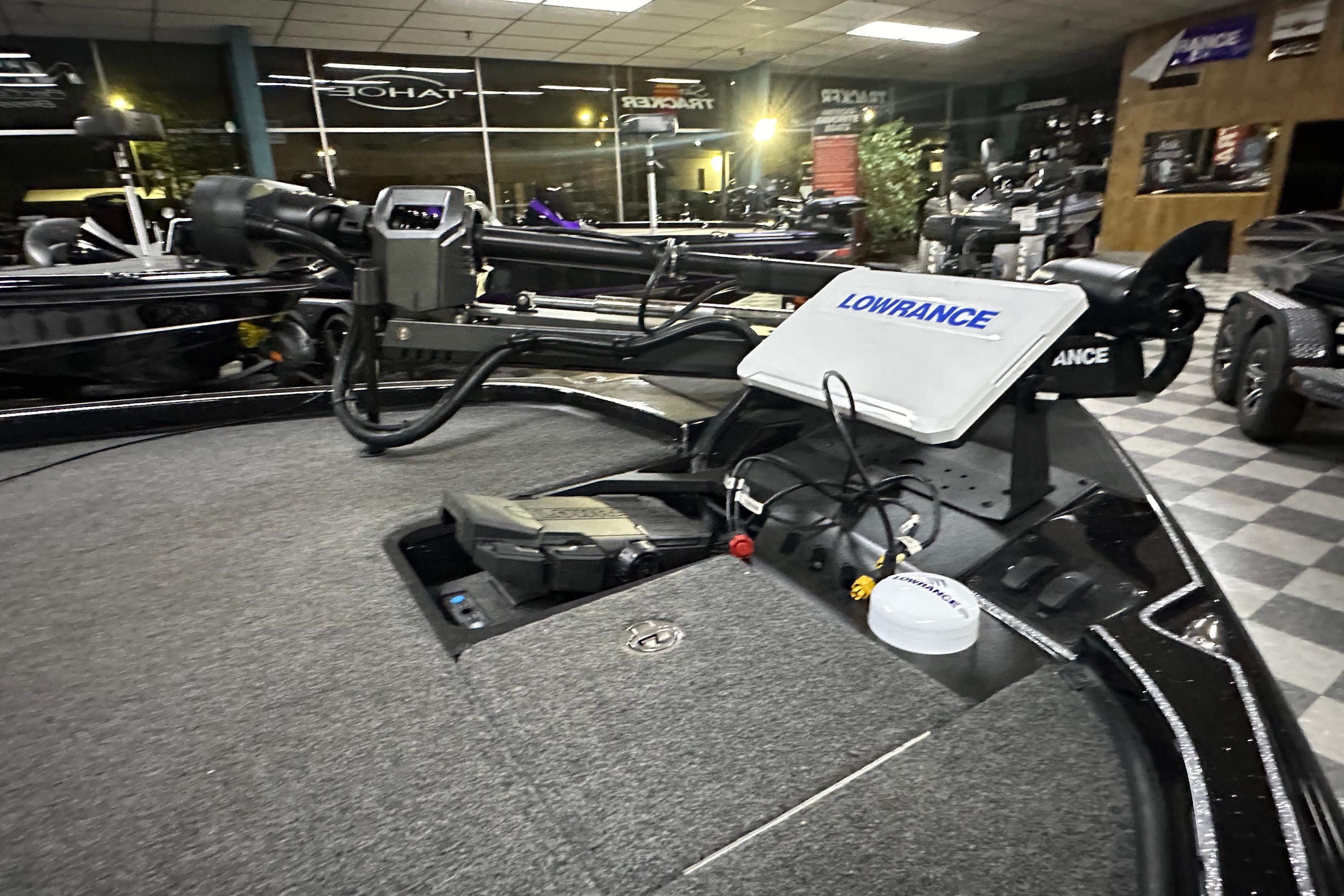 2025 Triton 21XP Patriot boat interior with Lowrance electronics and trolling motor.