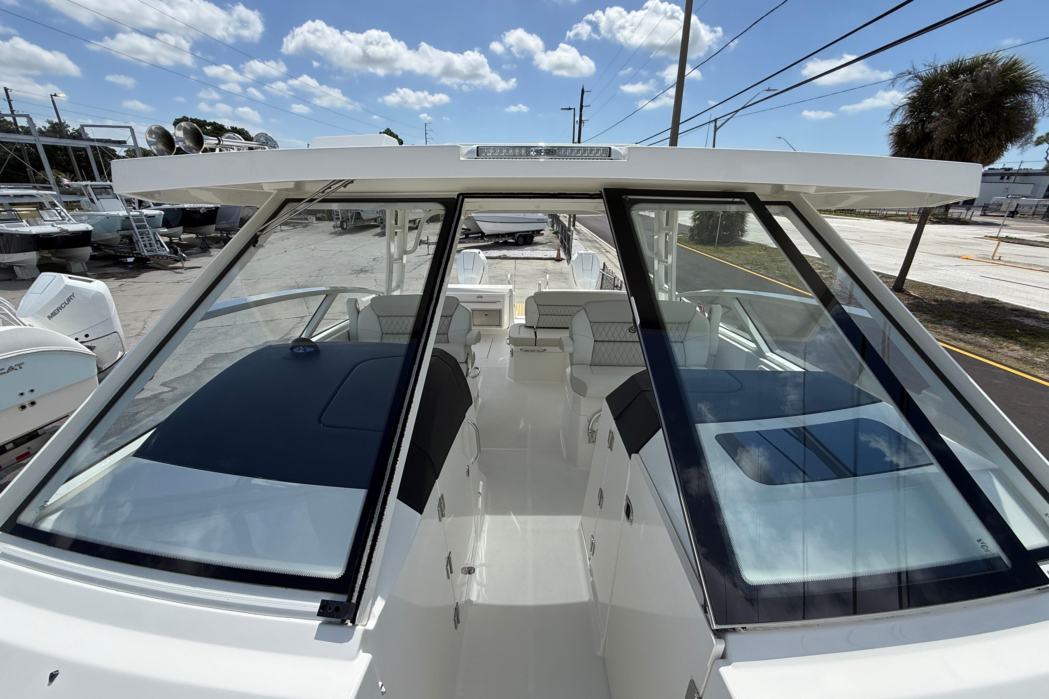 2026 World Cat 400 DC-X Island boat with sleek design and spacious interior.