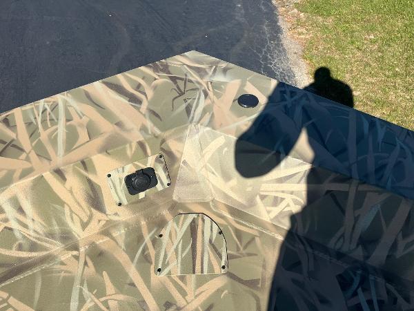 Camouflage pattern on 2025 Lowe Roughneck 2070 SC boat deck.
