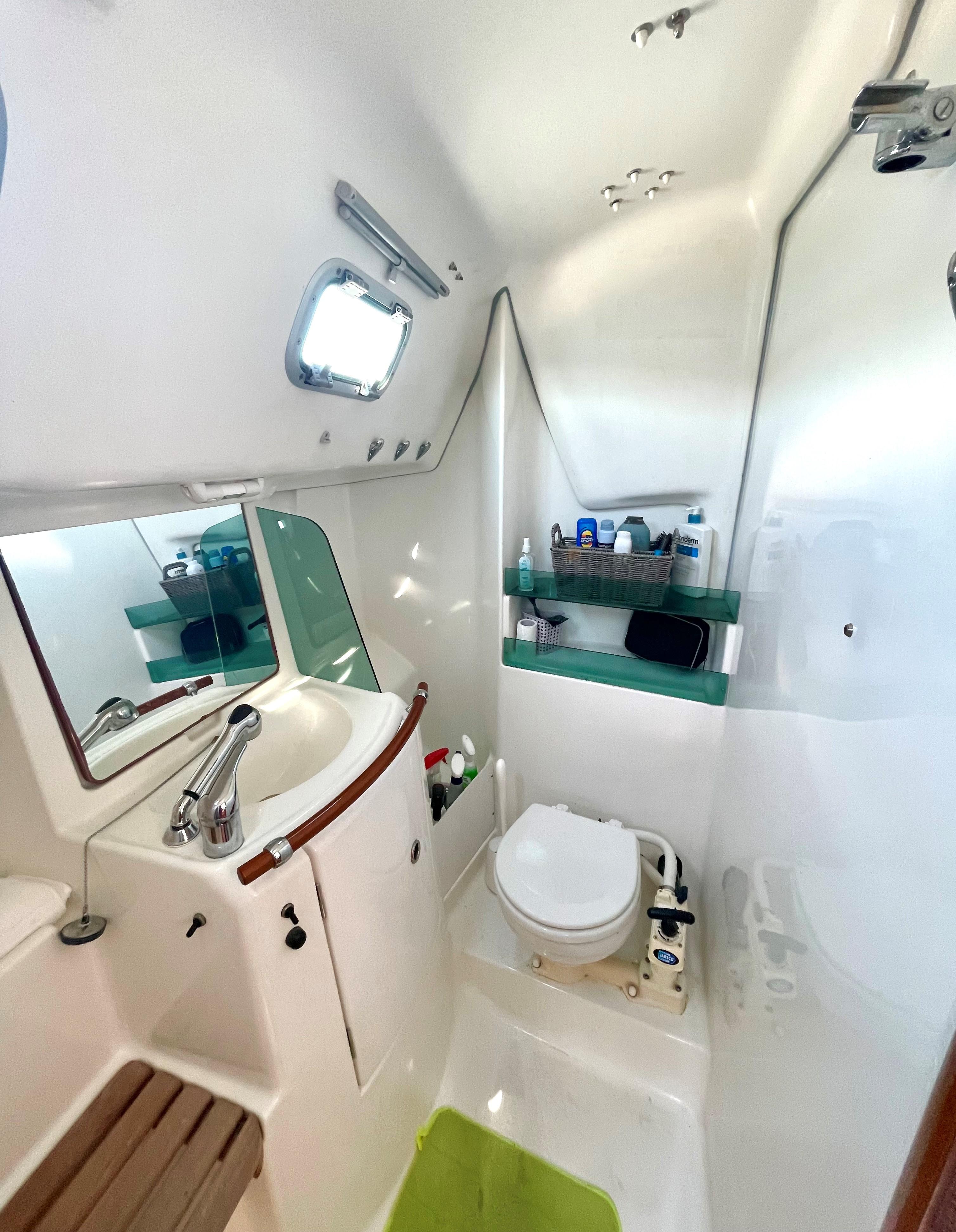 Interior view of Beneteau 323 yacht bathroom, year 2005.