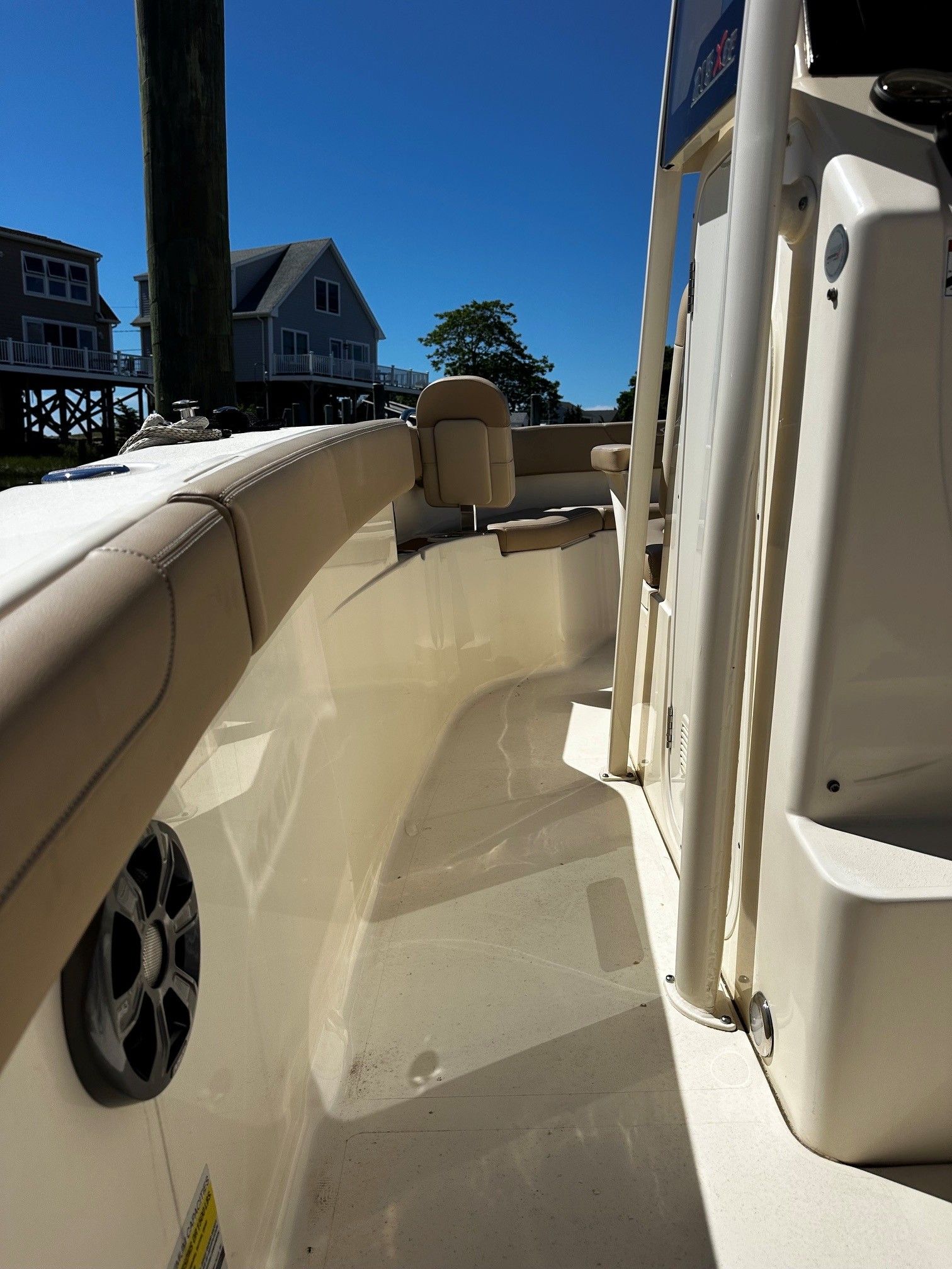 Scout 210XSF 2022 boat detail with seating area and speaker.