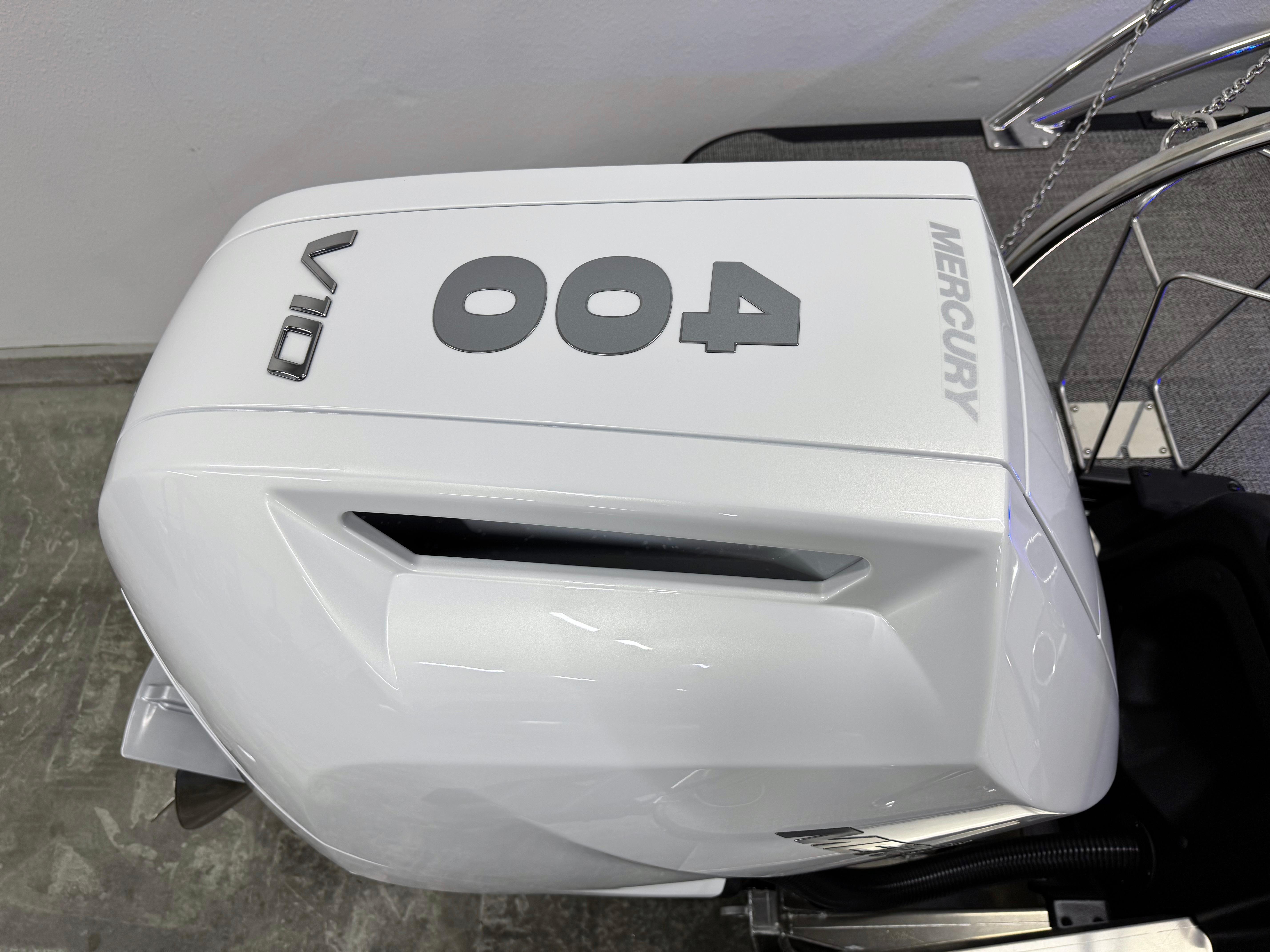 Outboard motor on 2025 Barletta Reserve Leggera R26UCA boat, featuring Mercury branding.