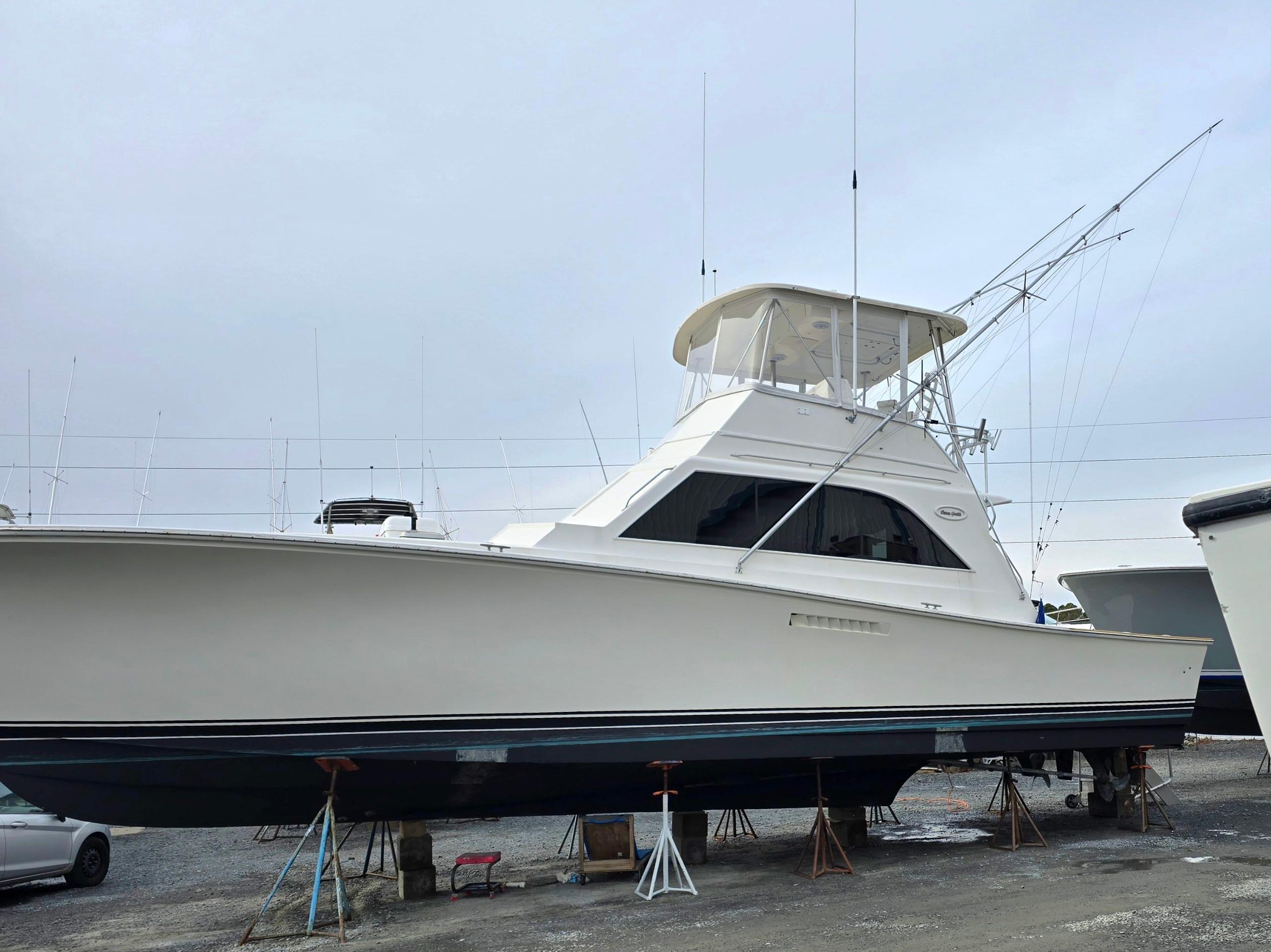 1984 Ocean Yachts 46 Super Sport boat on stands, side view.