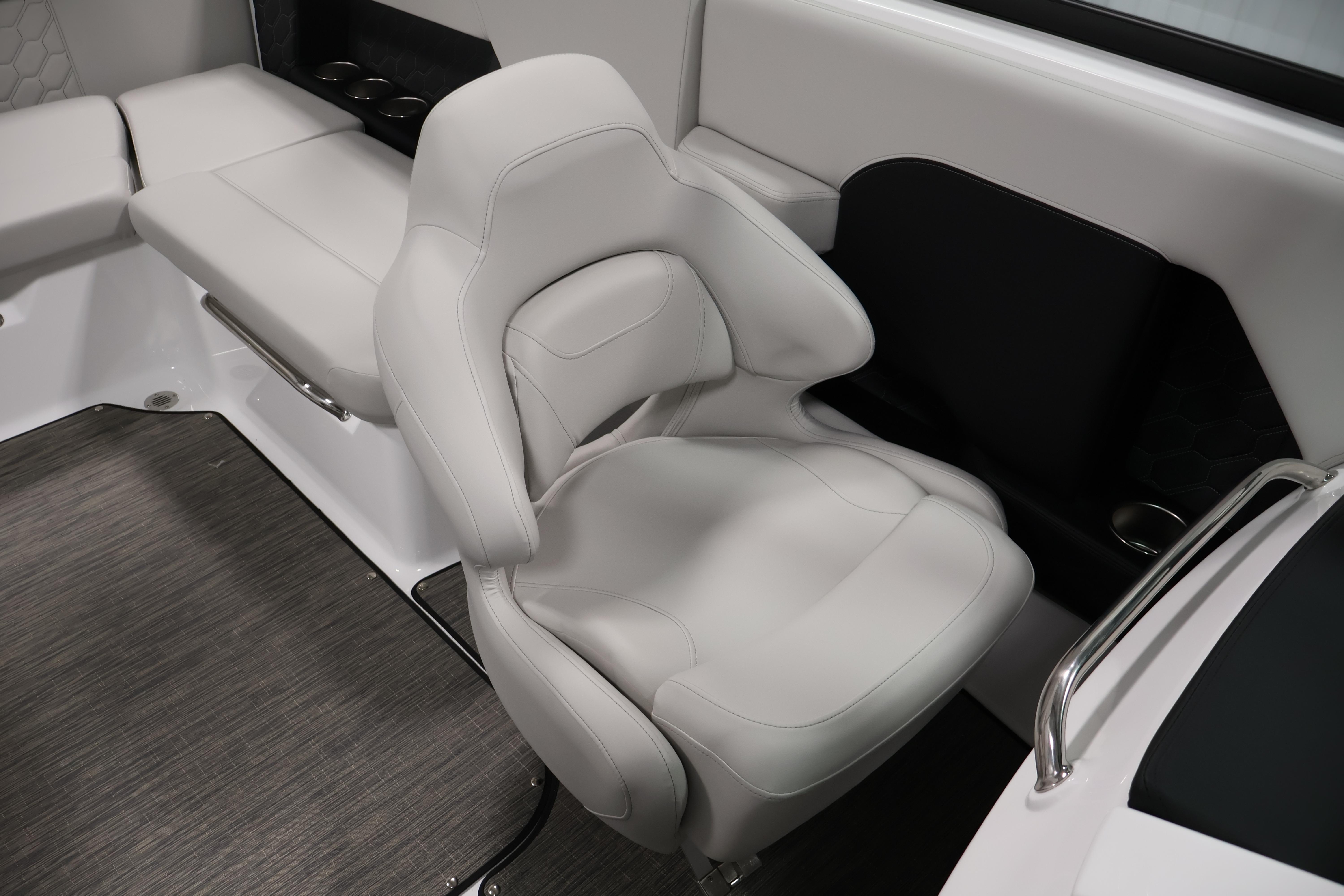 Luxurious seating in 2026 Four Winns H4 Freedom boat interior.