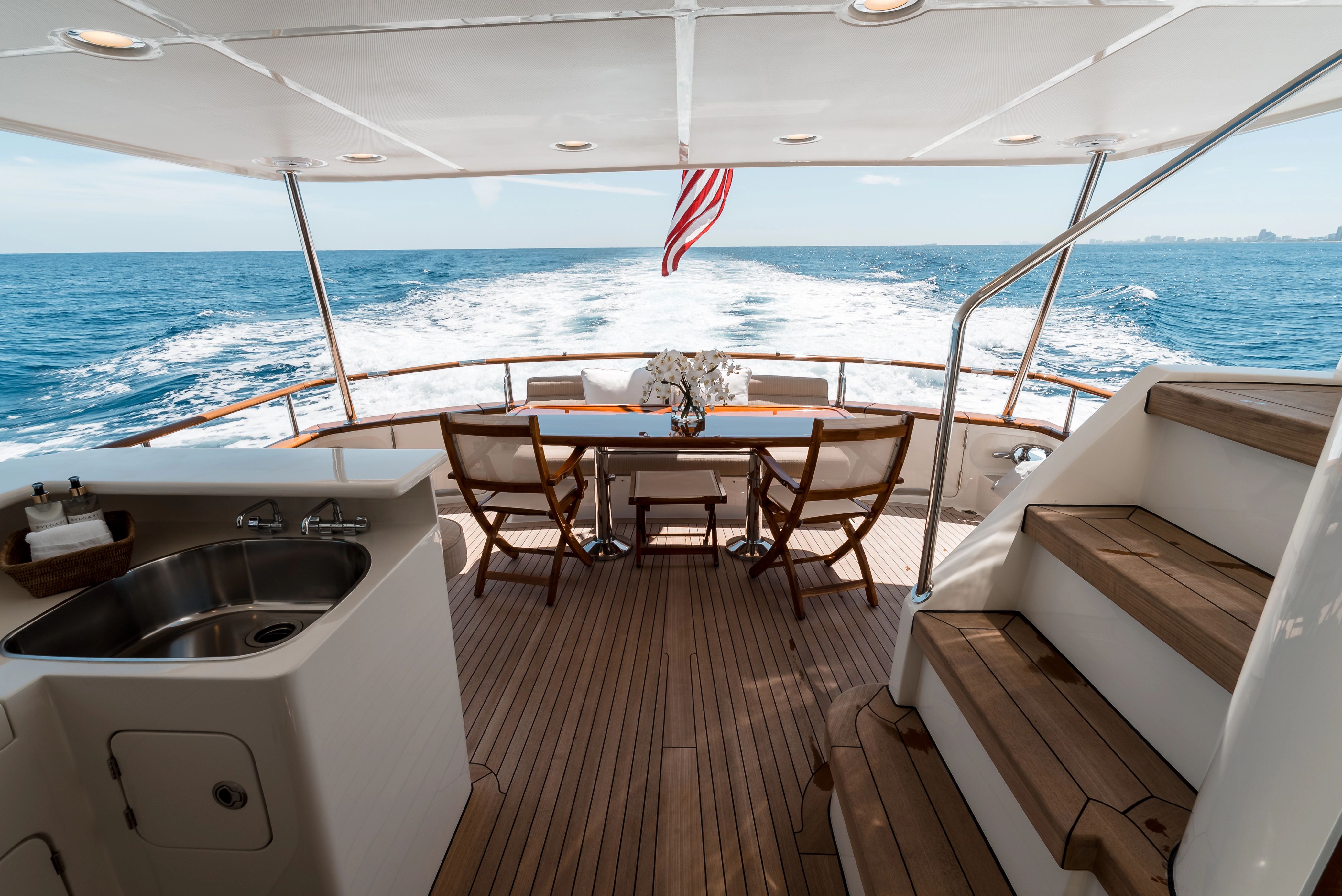Marlow Explorer 2011 yacht with deck view and ocean backdrop.