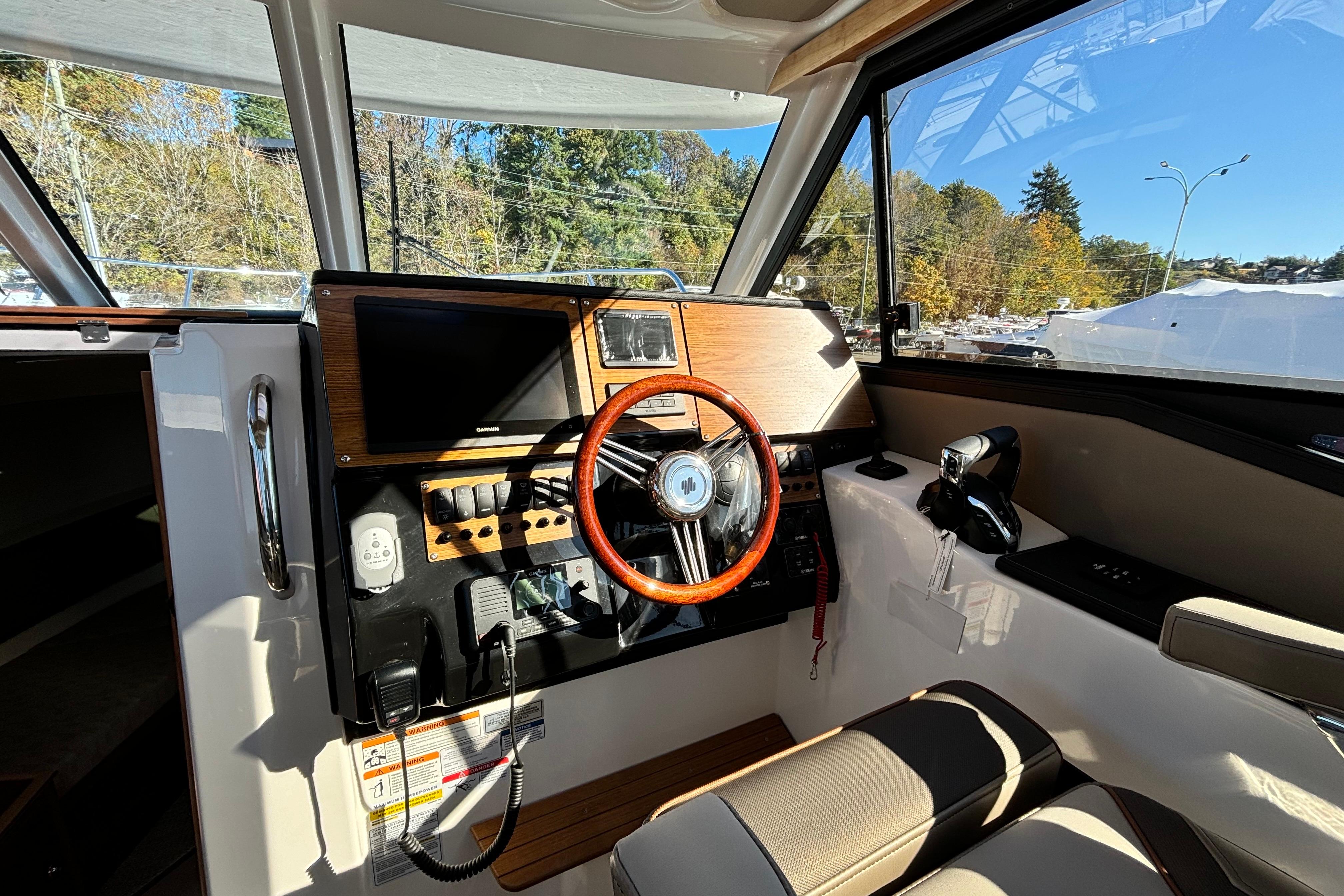 Interior of 2026 Cutwater C-288 Coupe with modern helm console.