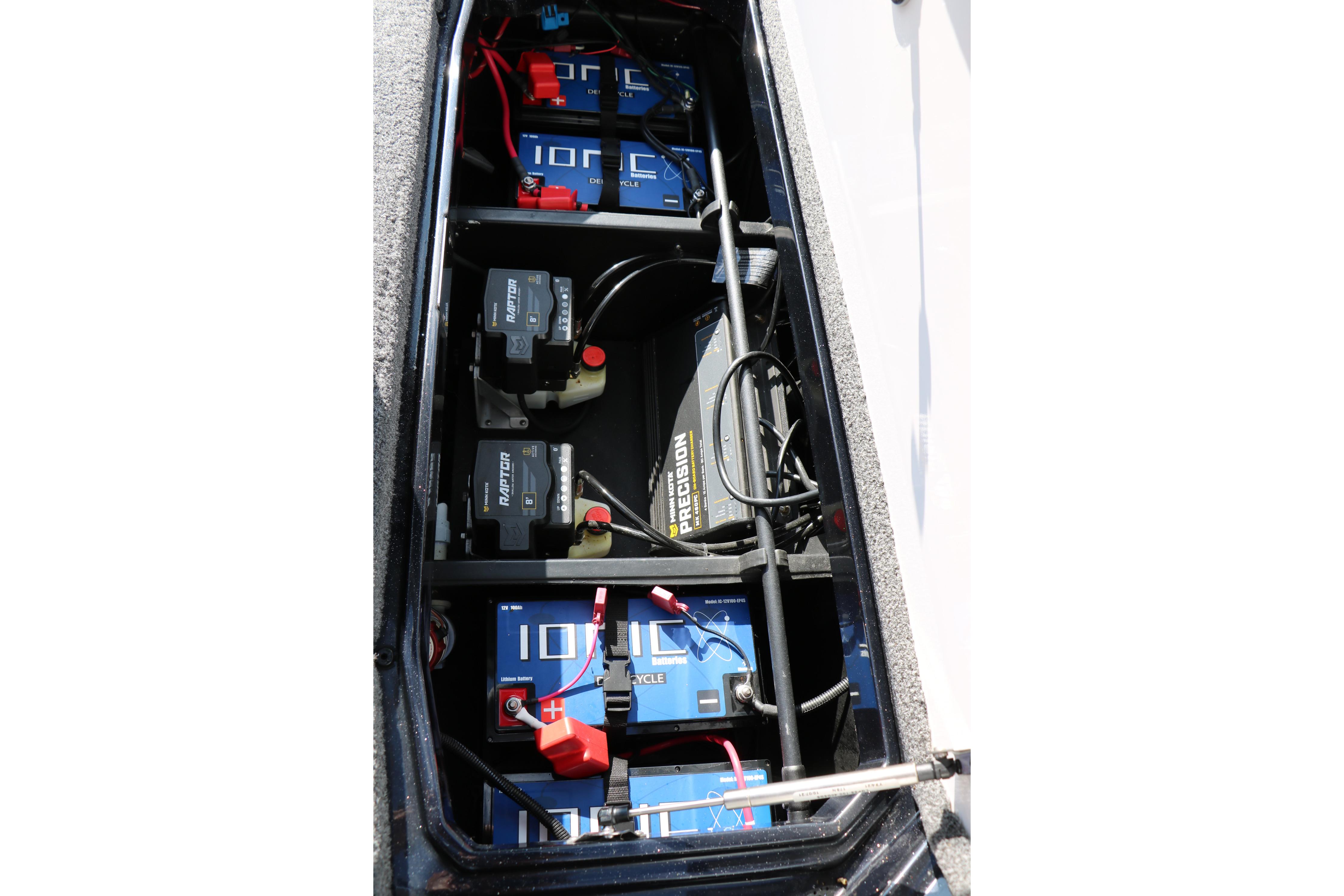 Battery compartment of 2022 Vexus VX21 boat with multiple Ionic deep cycle batteries.