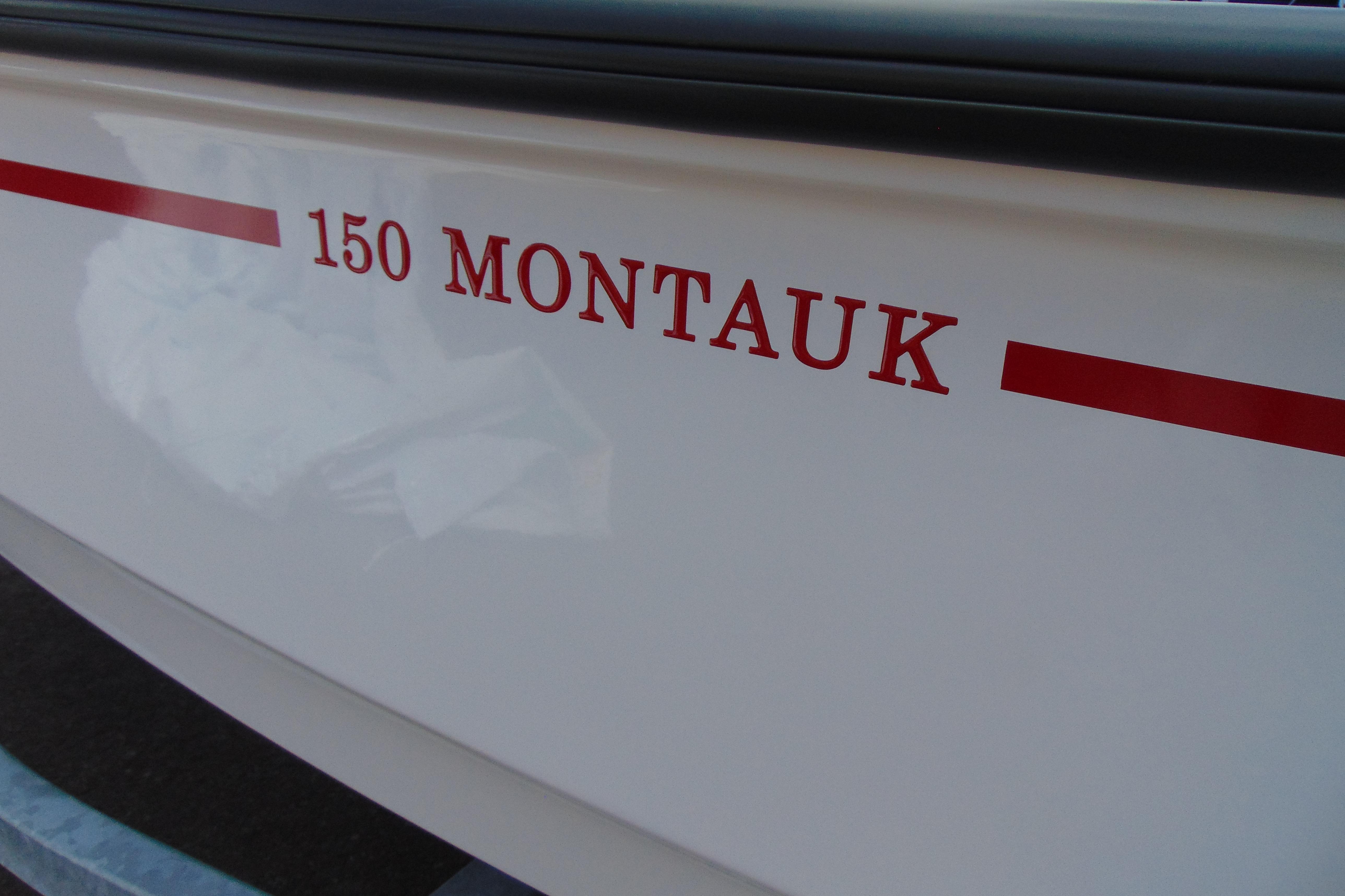 2026 Boston Whaler 150 Montauk boat side view with red lettering.