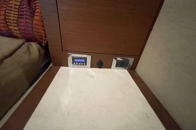 Interior of 2016 Sea Ray Sundancer 510 yacht, featuring control panel and modern design elements.