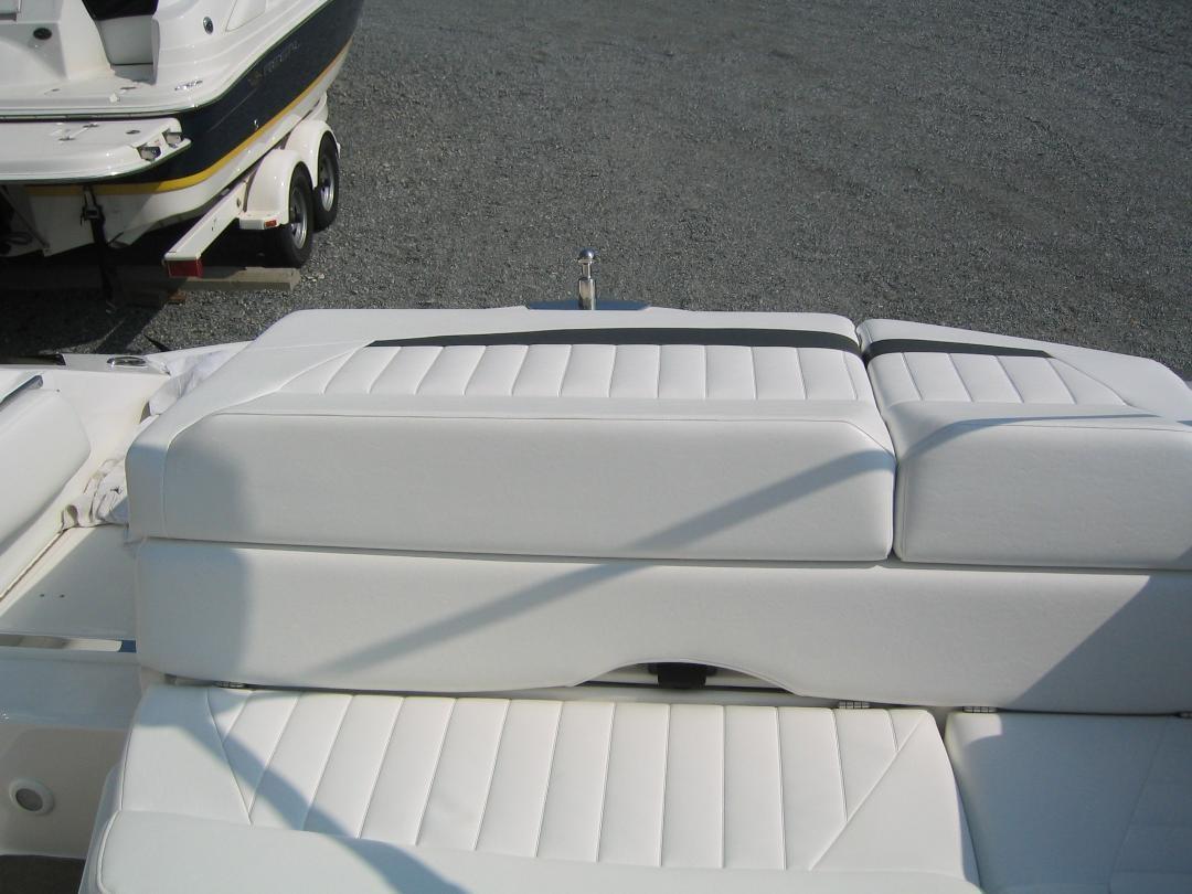White seating on a 2008 Regal 2250 Cuddy boat.