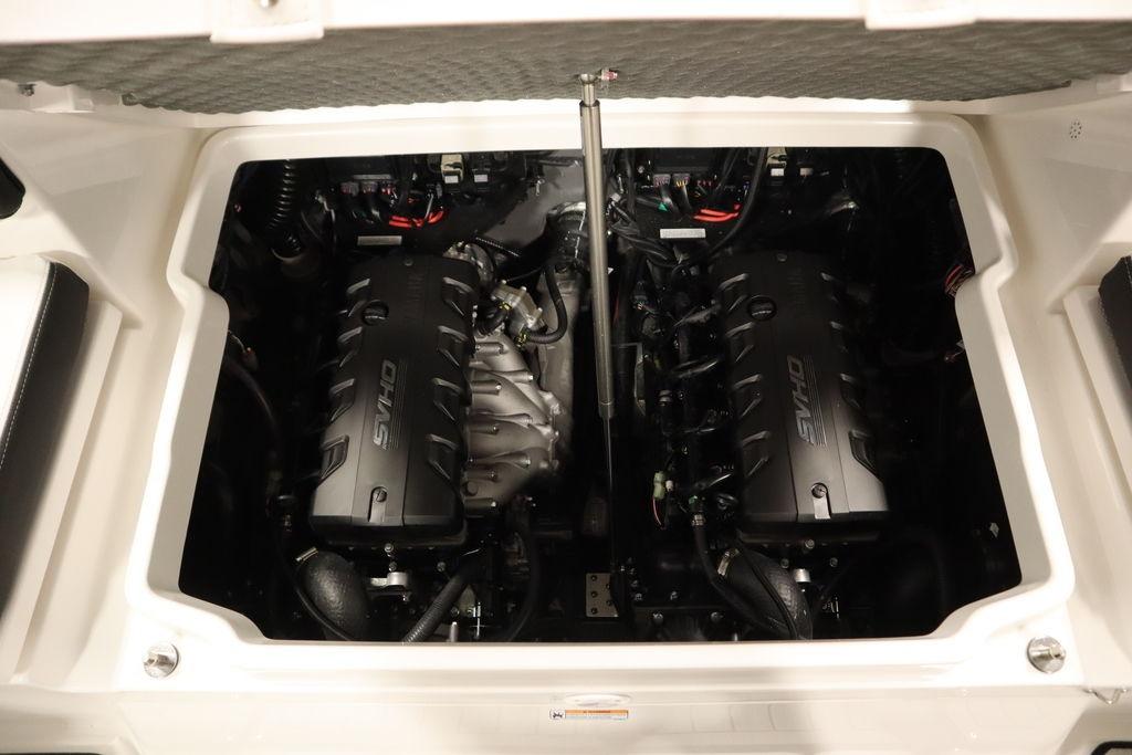 2026 Yamaha Boats 255 FSH Sport E engine compartment with dual SHVO engines.
