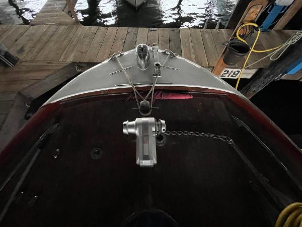 1951 Chris-Craft Catalina boat docked, top view showing deck and mooring lines.