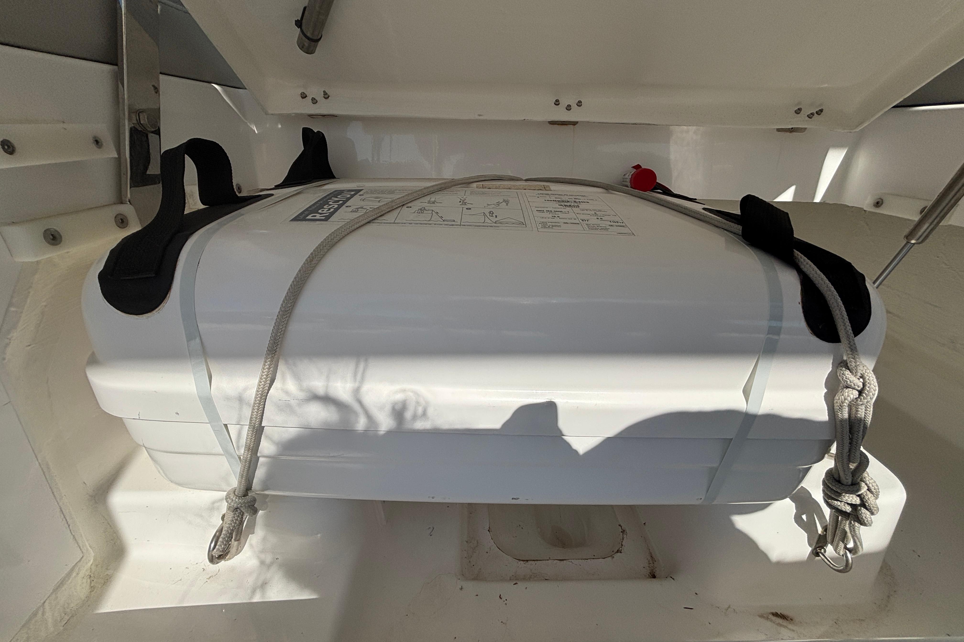 Safety equipment storage on 2025 Leopard 42 yacht, featuring secured white container.