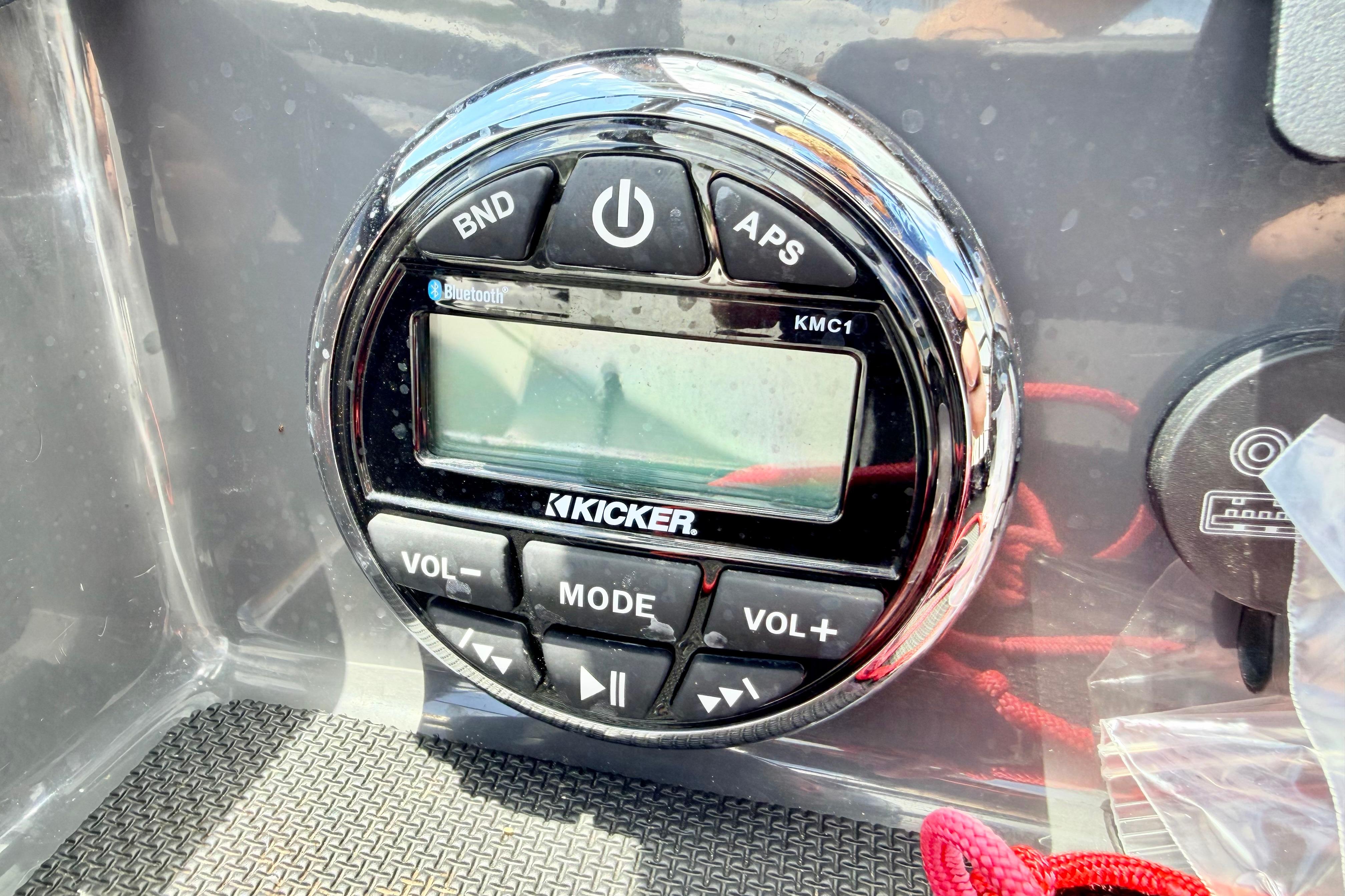 Kicker KMC1 audio system on 2018 Glastron GT 185 boat dashboard.