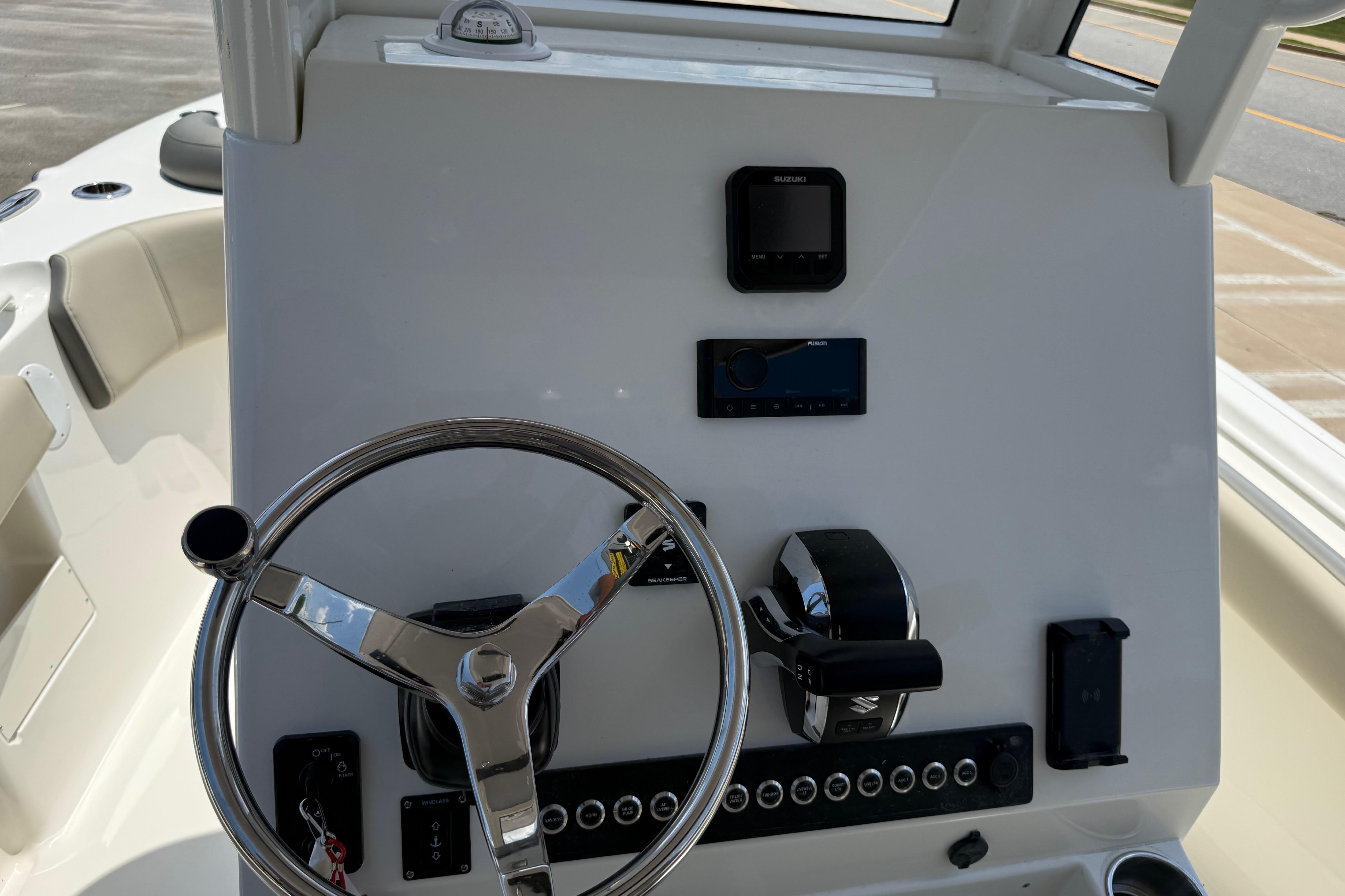 Steering console of 2027 Key West 249 FS boat with modern controls and gauges.