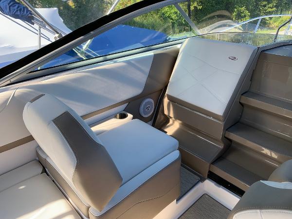 Interior of a 2017 Regal 26 Express boat with beige and white seating.