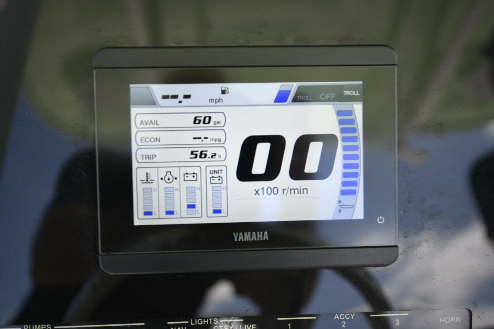 Yamaha display on 2023 Sea Pro 239 Deep V CC showing fuel and trip data.