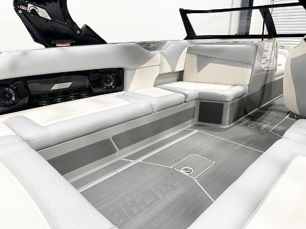Luxurious interior of 2025 Supreme S240 boat with sleek seating and modern design.