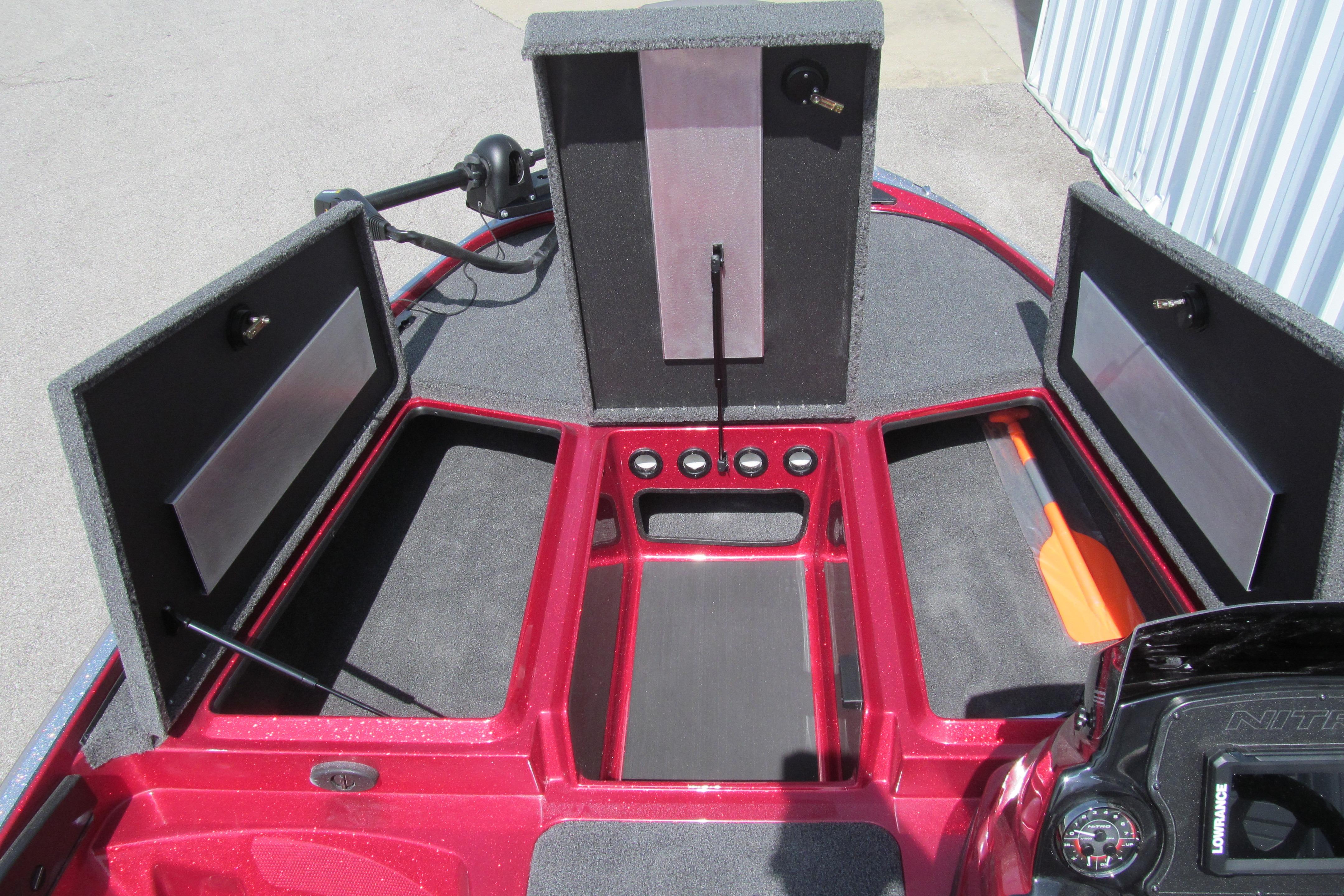 Open storage compartments on a 2026 Nitro Z17 boat deck.