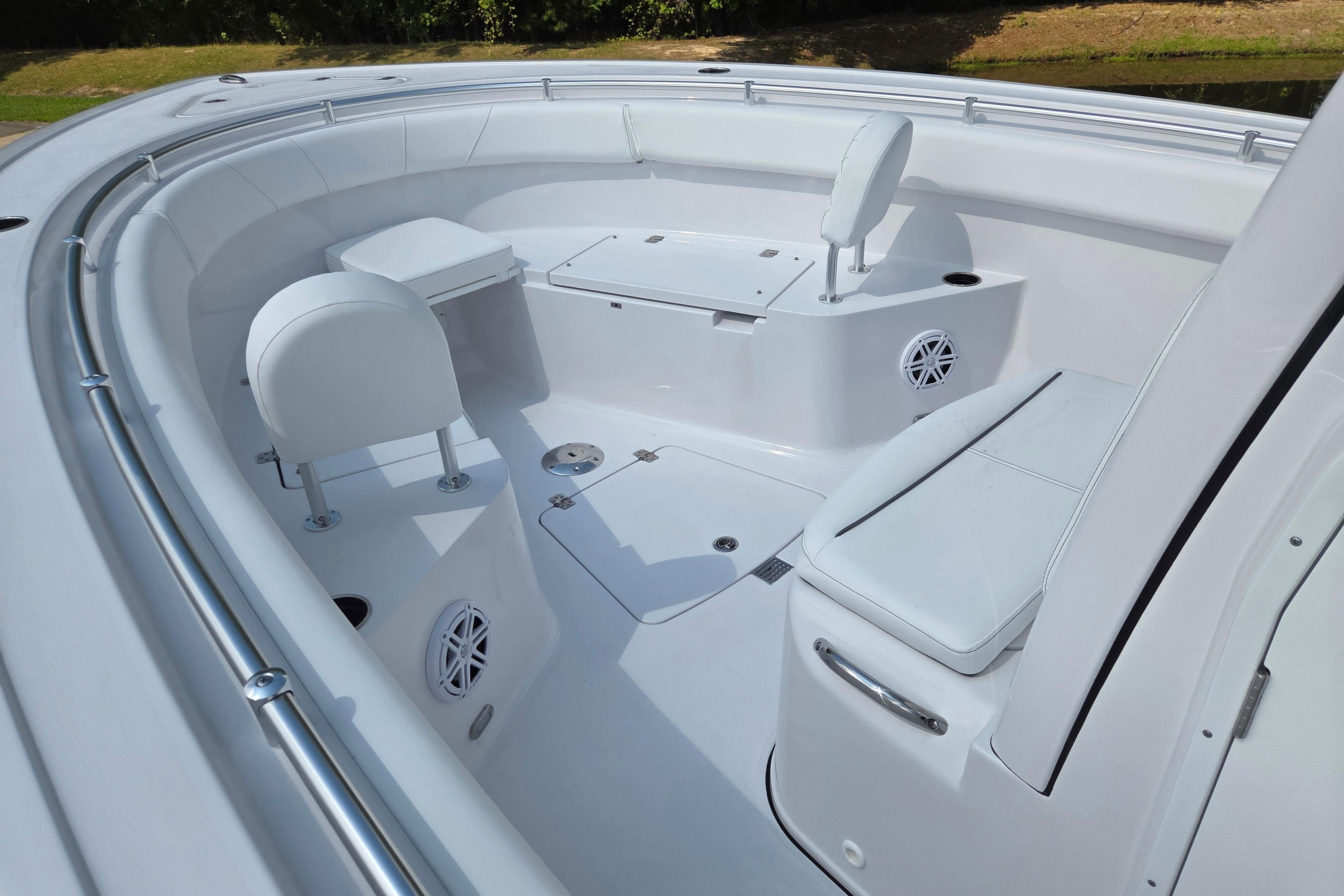 2026 Sportsman Open 252 Center Console boat interior with seating and storage.
